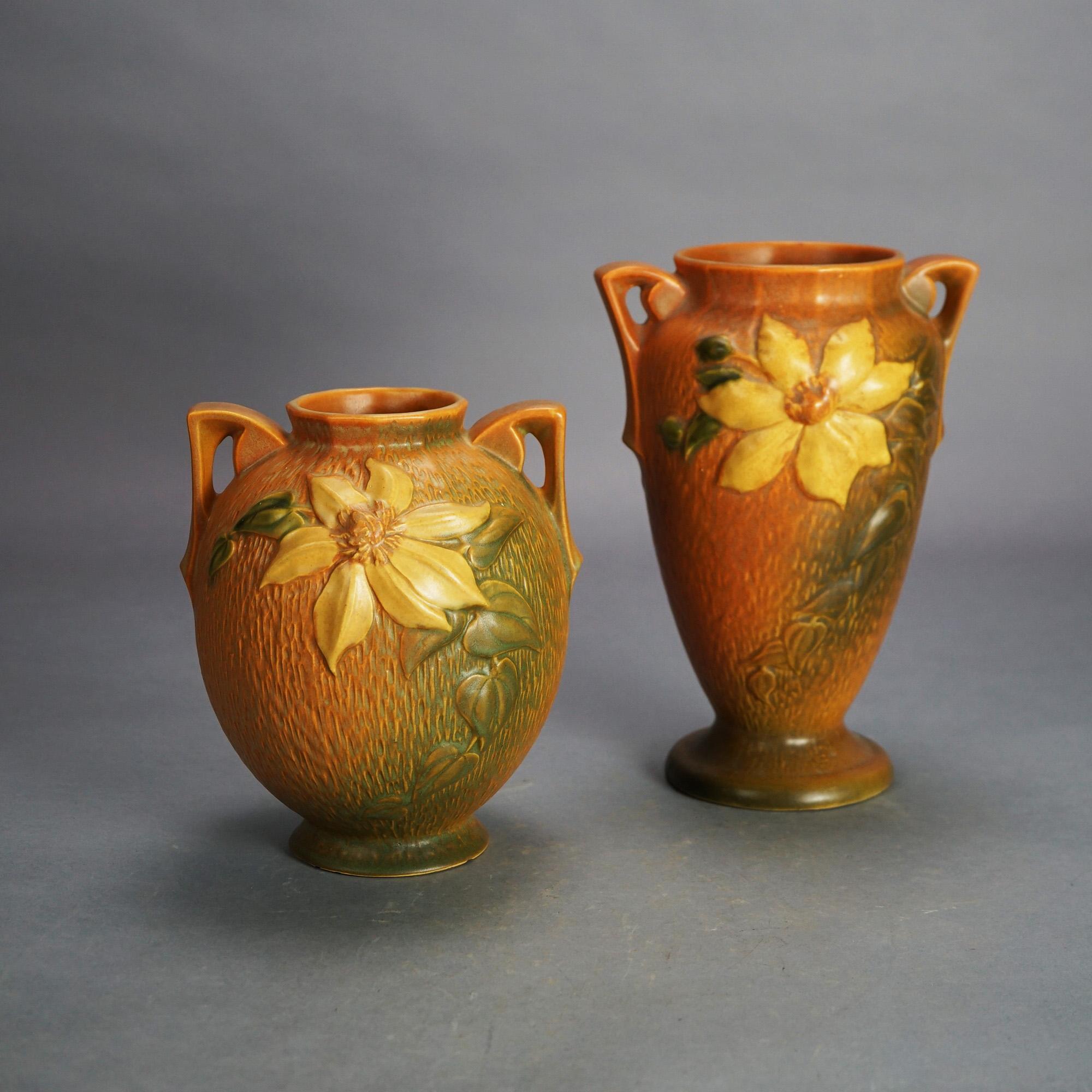 Two Brown Roseville Art Pottery Vases with Clematis Pattern Mid 20thC

Measures - 10.5