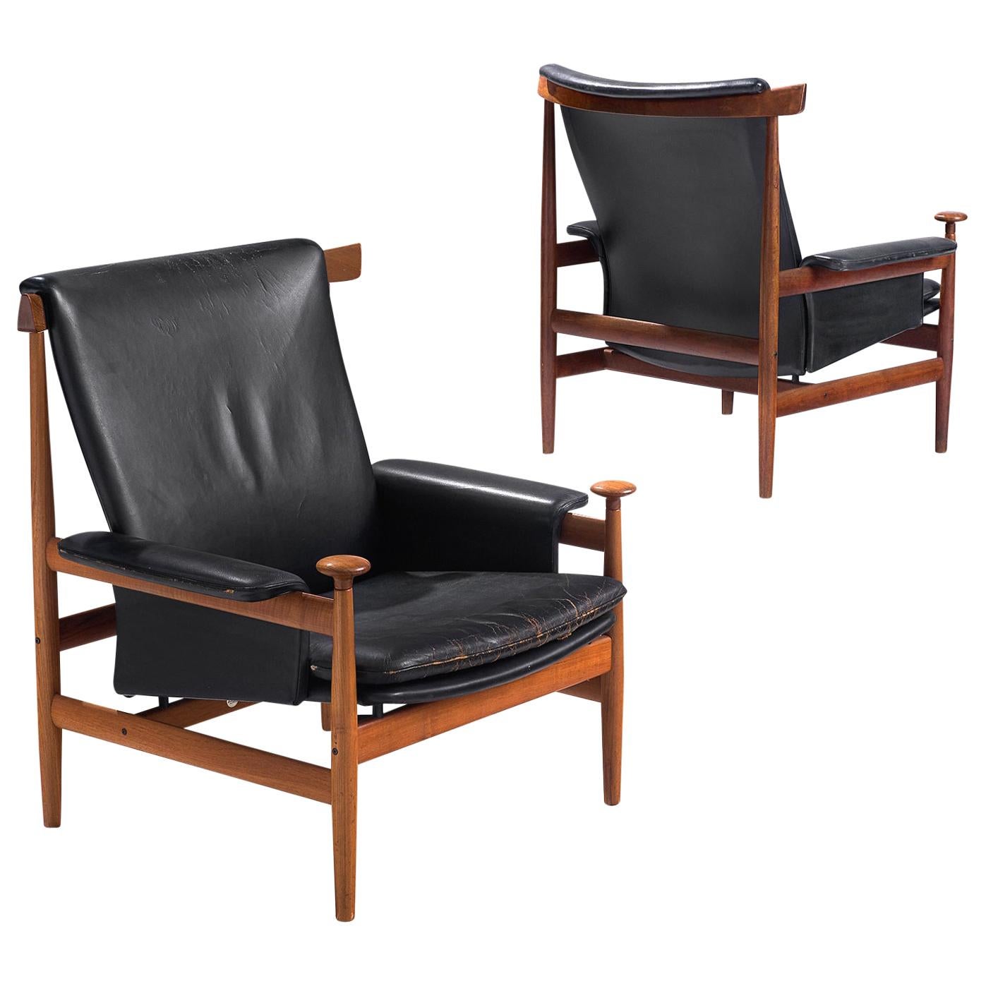 Two "Bwana" Chairs with Black Leather by Finn Juhl