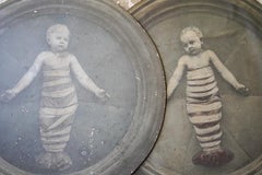 Two C.1900 Gelatin Tondo Prints of Babies in Swaddling Clothes by Della Robbia
