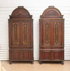 Two Cabinets in Blackened, Painted and Gilt Wood