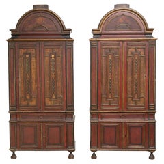 Two Cabinets in Blackened, Painted and Gilt Wood