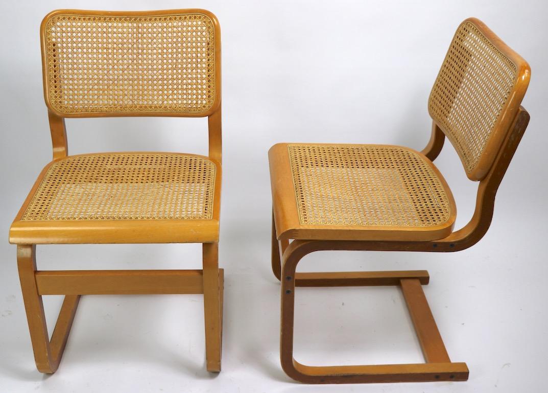 Two Cantilever Cane and Bentwood Dining Chairs after Alto and Breuer 2