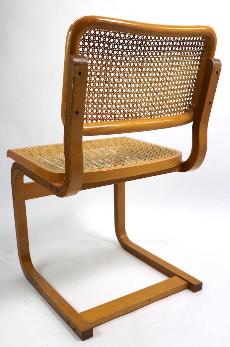Mid-Century Modern Two Cantilever Cane and Bentwood Dining Chairs after Alto and Breuer