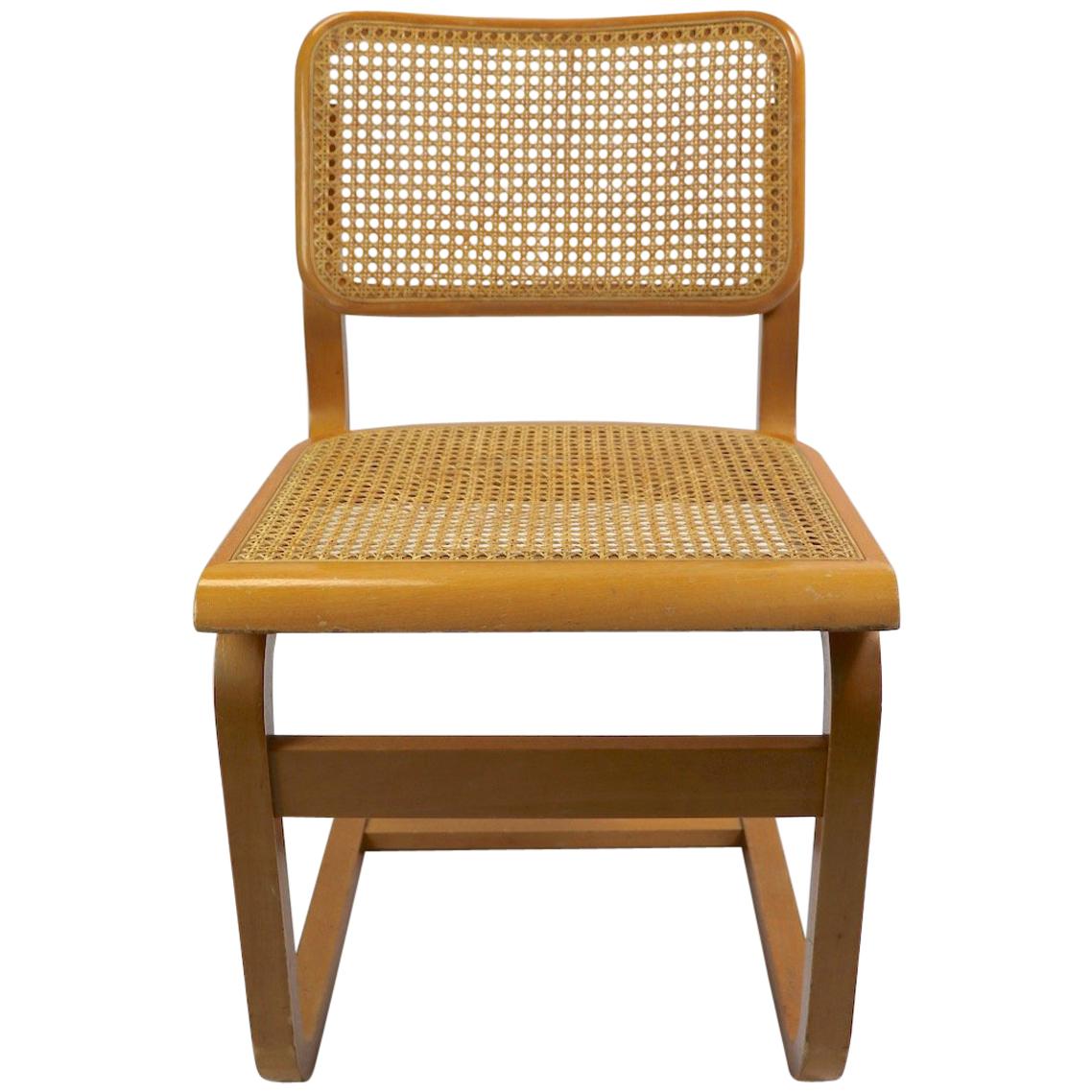 Two Cantilever Cane and Bentwood Dining Chairs after Alto and Breuer