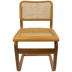 Two Cantilever Cane and Bentwood Dining Chairs after Alto and Breuer