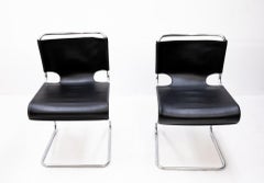 Two Pascal Mourque cantilever chairs model Biscia
