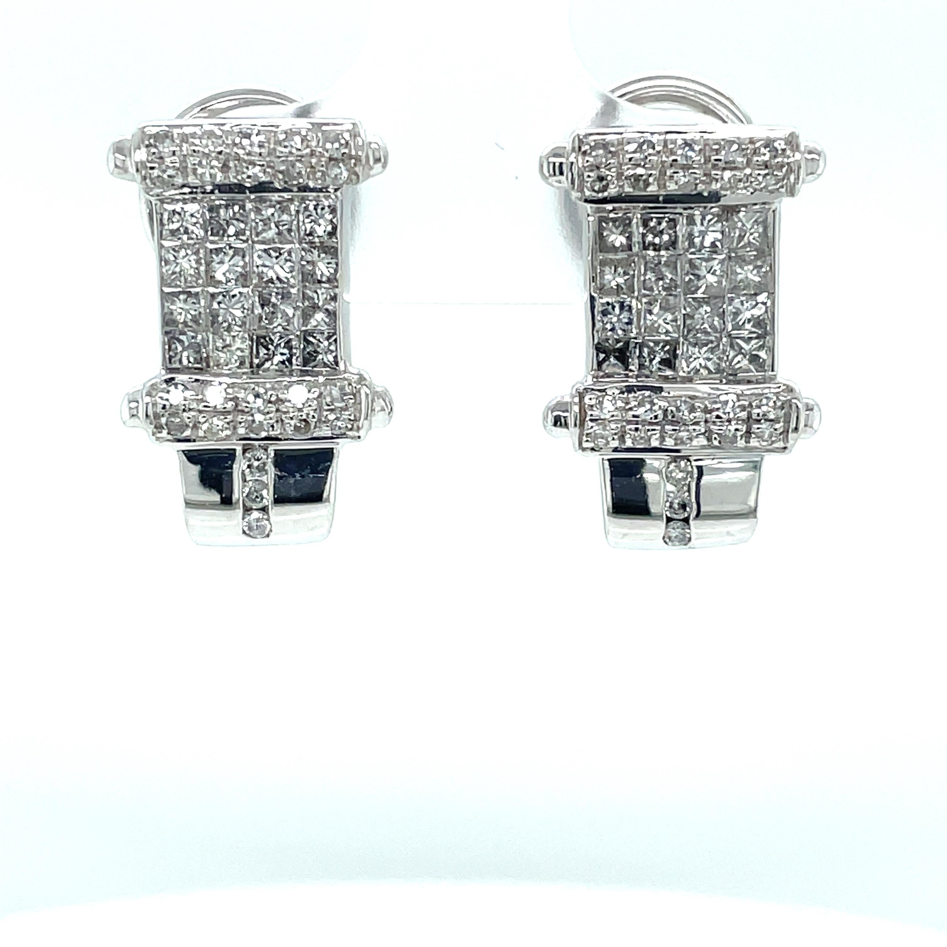 Diamonds glisten on this unique column-shaped 14 karat white gold earring pair. Thirty two sparkling square cut 1.3 x 1.3 mm diamonds are accented by another forty six 1 mm diamond enhancements, 2.29 total carat weight of H/ SI1 diamonds. The
