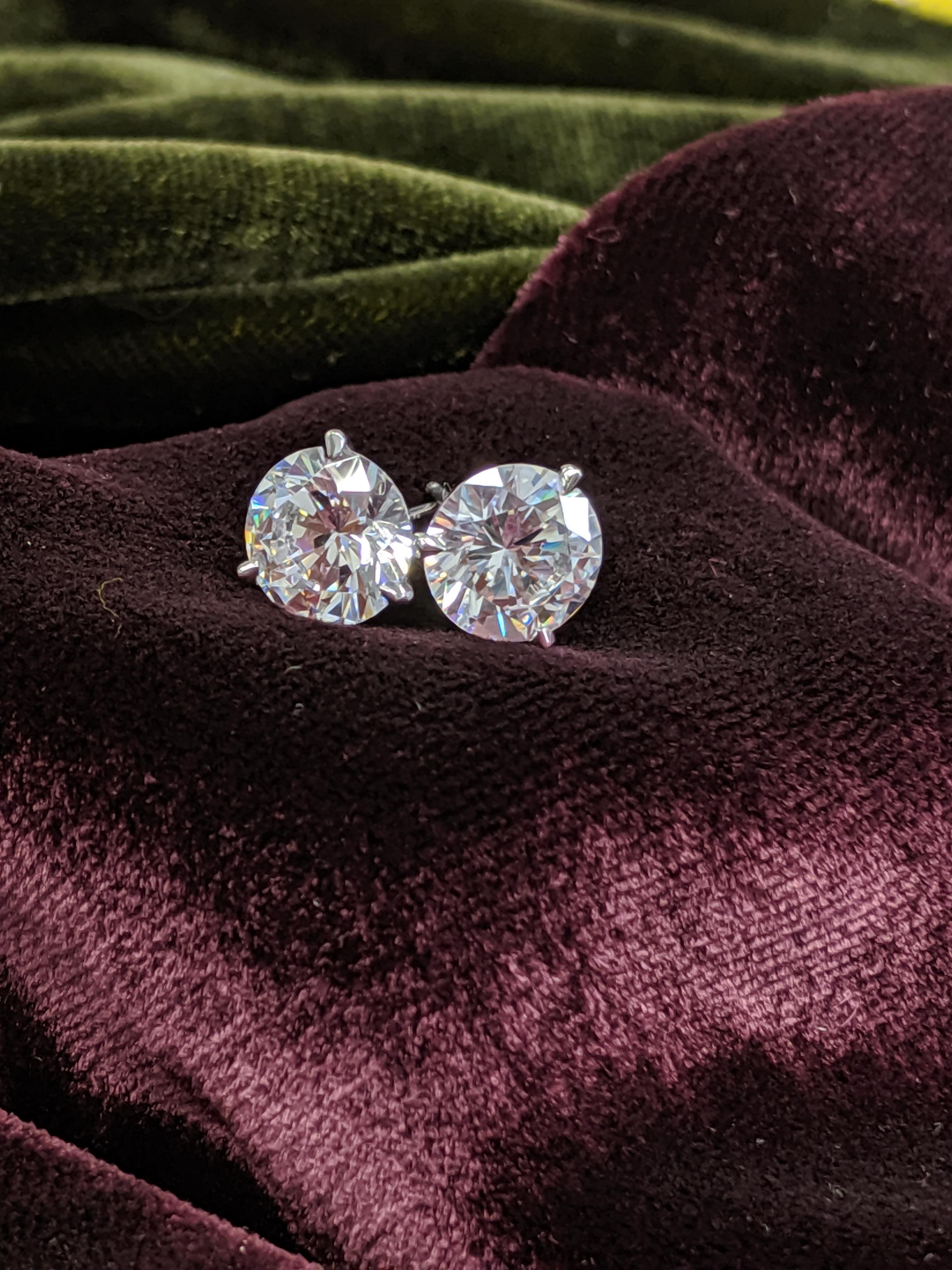 Custom mounted for you, these CLASSIC, clean, large and brilliant 4 carat total (2 carat each) Diamond Ear Studs are a staple in your luxury portfolio.  Our finest offering of Round Brilliant Cut Diamonds come with GIA grading reports with the