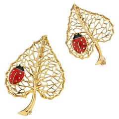 Two Cartier Paris Modernist Yellow Gold Enamel Ladybug Leaf Brooches