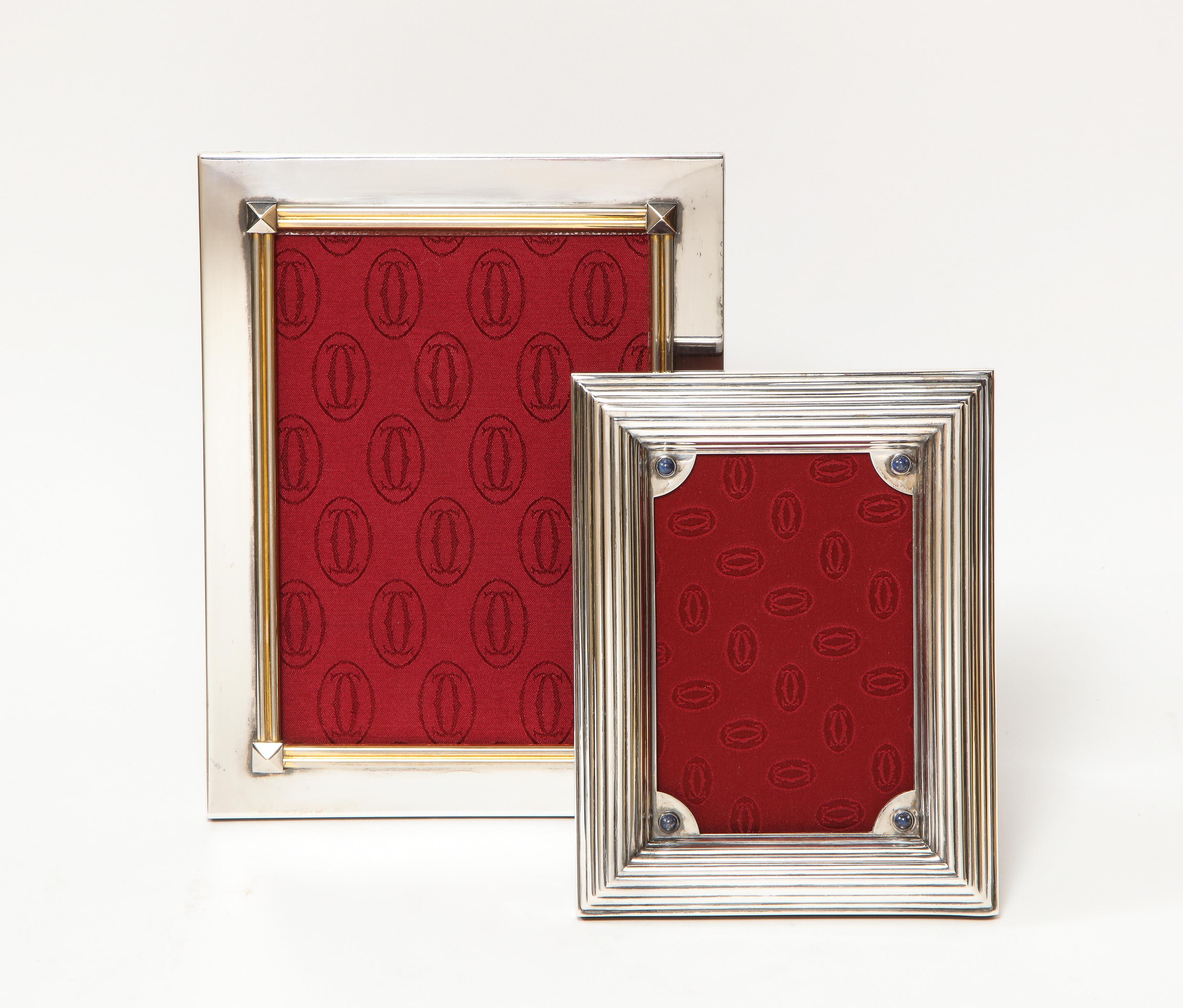 Two Cartier silvered metal picture frames, 20th century.

The smaller one with lapis beads and the larger one with gilt border.

Smaller frame overall: 7.5