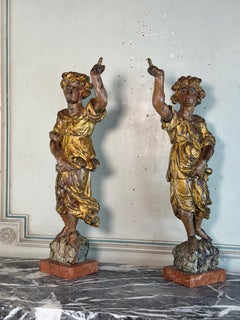 Two carved and gilded wooden angels, Venice, 18th century