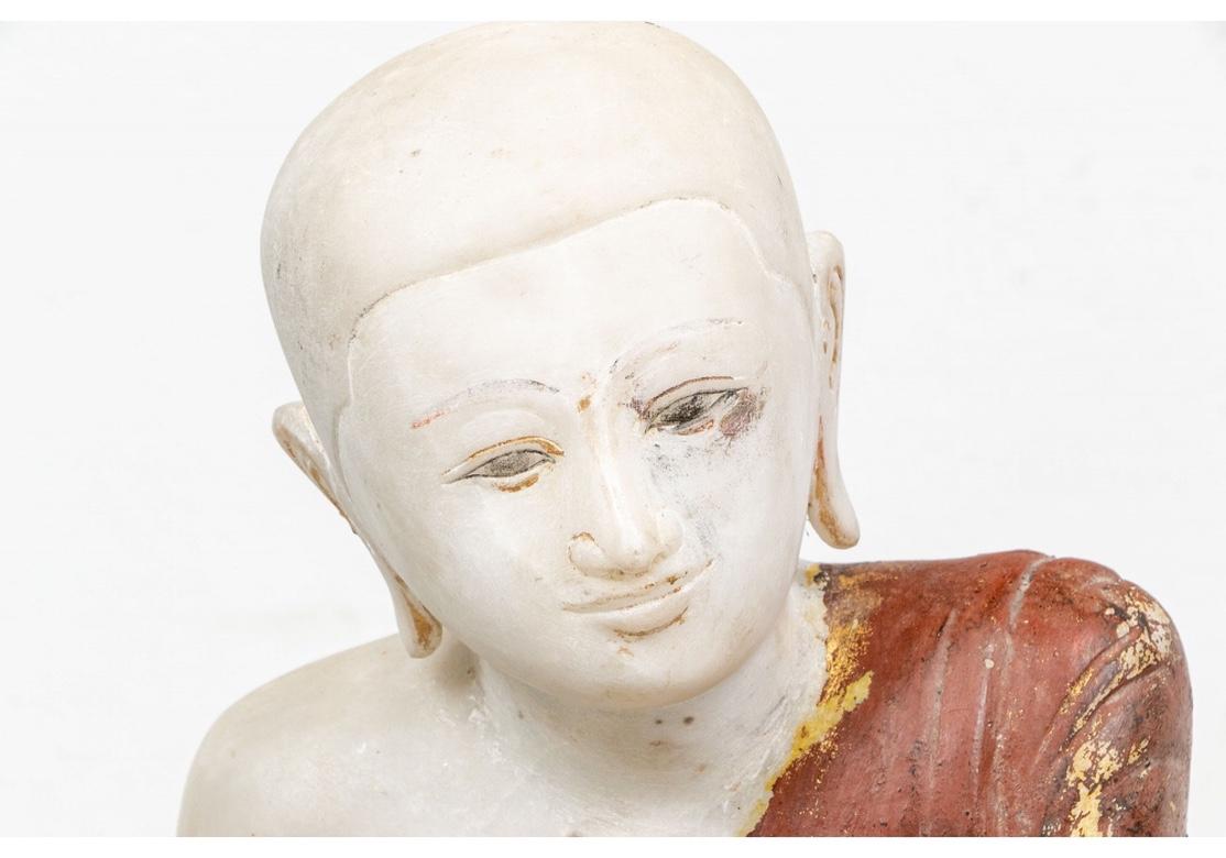 Agra Two Carved and Painted Marble Buddhist Figures For Sale