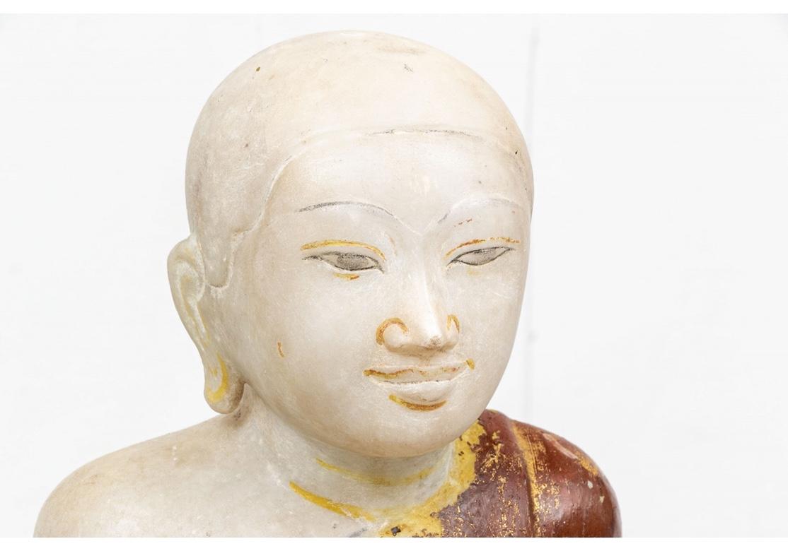 Hand-Carved Two Carved and Painted Marble Buddhist Figures For Sale
