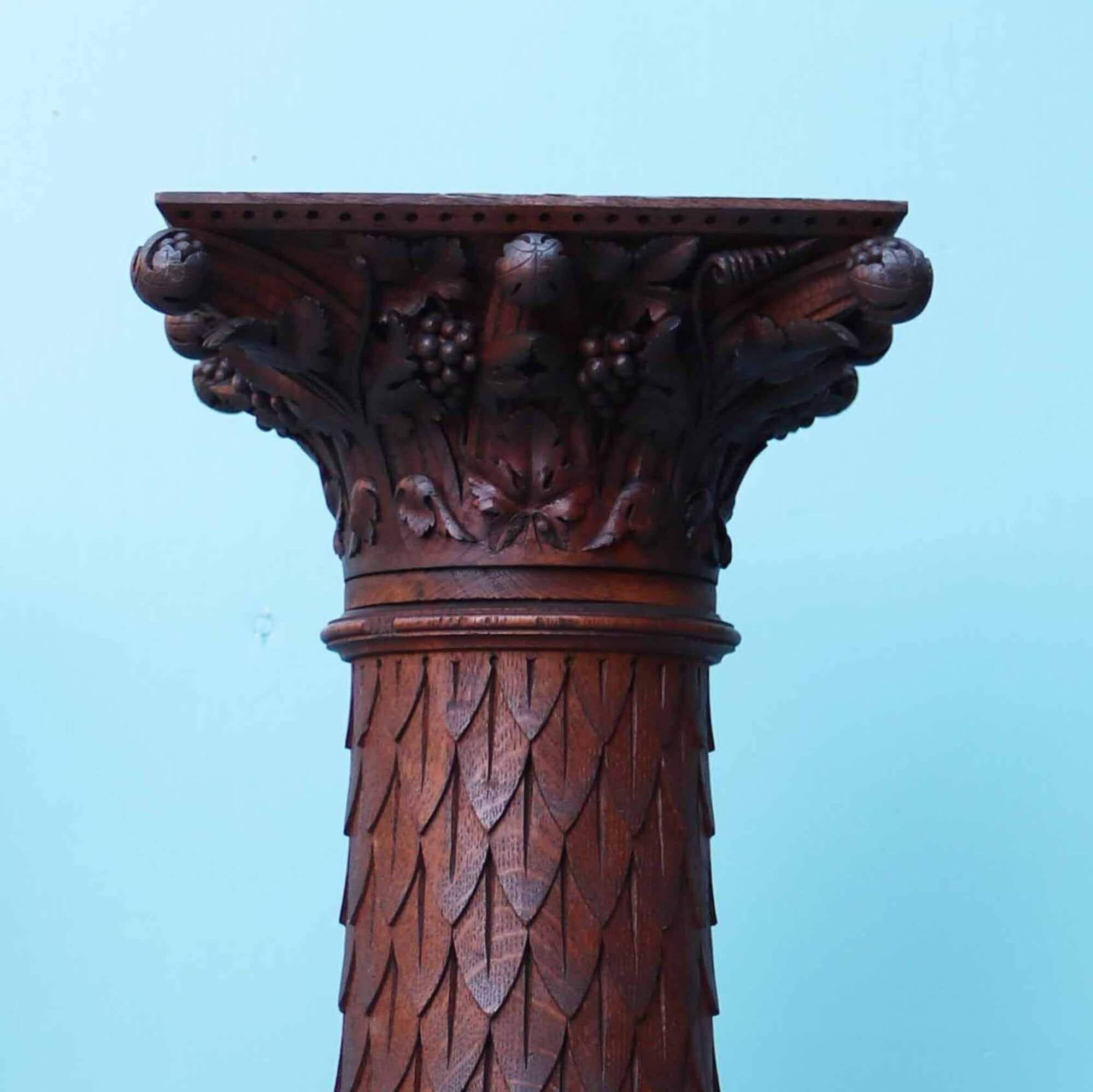 20th Century Two Carved Oak Column Pedestals For Sale
