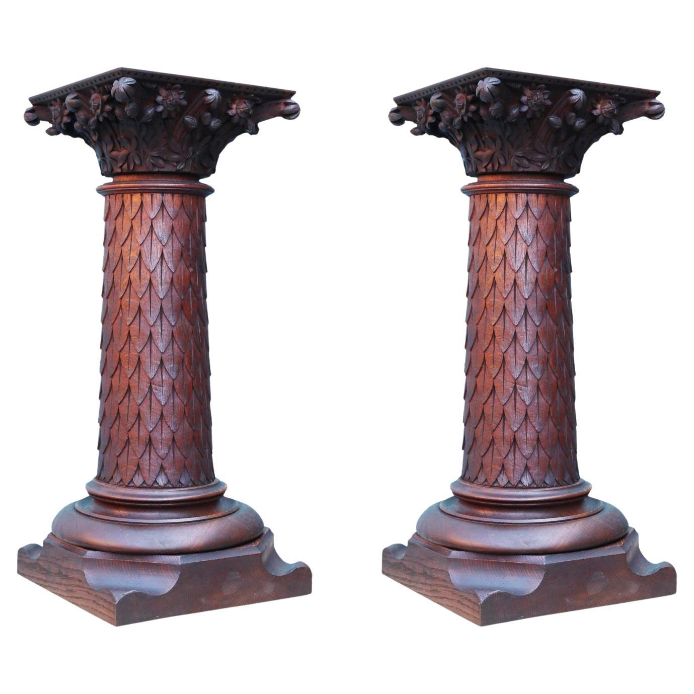 Two Carved Oak Column Pedestals