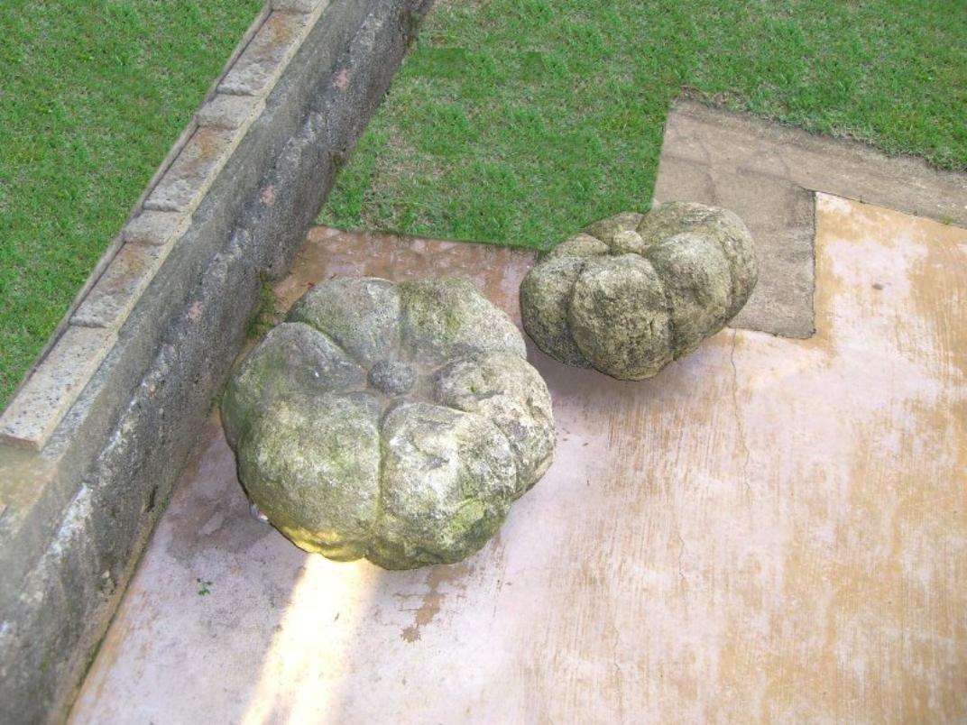 Pair of impressive and unique 18th Century Portuguese carved stone pumpkins.
These stone pumpkins would make a great statement in any backyard or garden.
Large pumpkin: H. 12