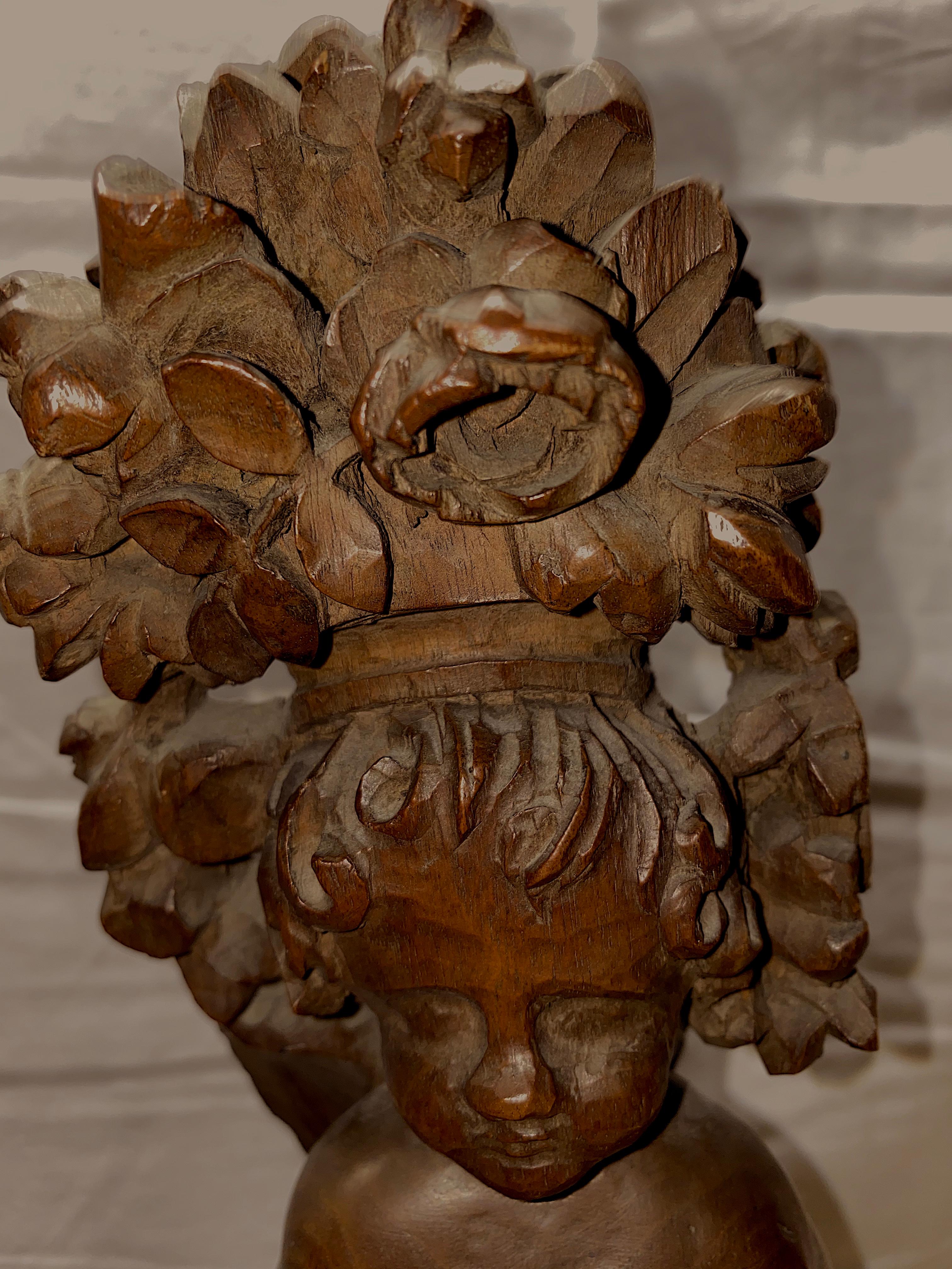 Hand-Carved Two Carved Wood 18th Century Baroque Cupids, with Crown of Foliage For Sale