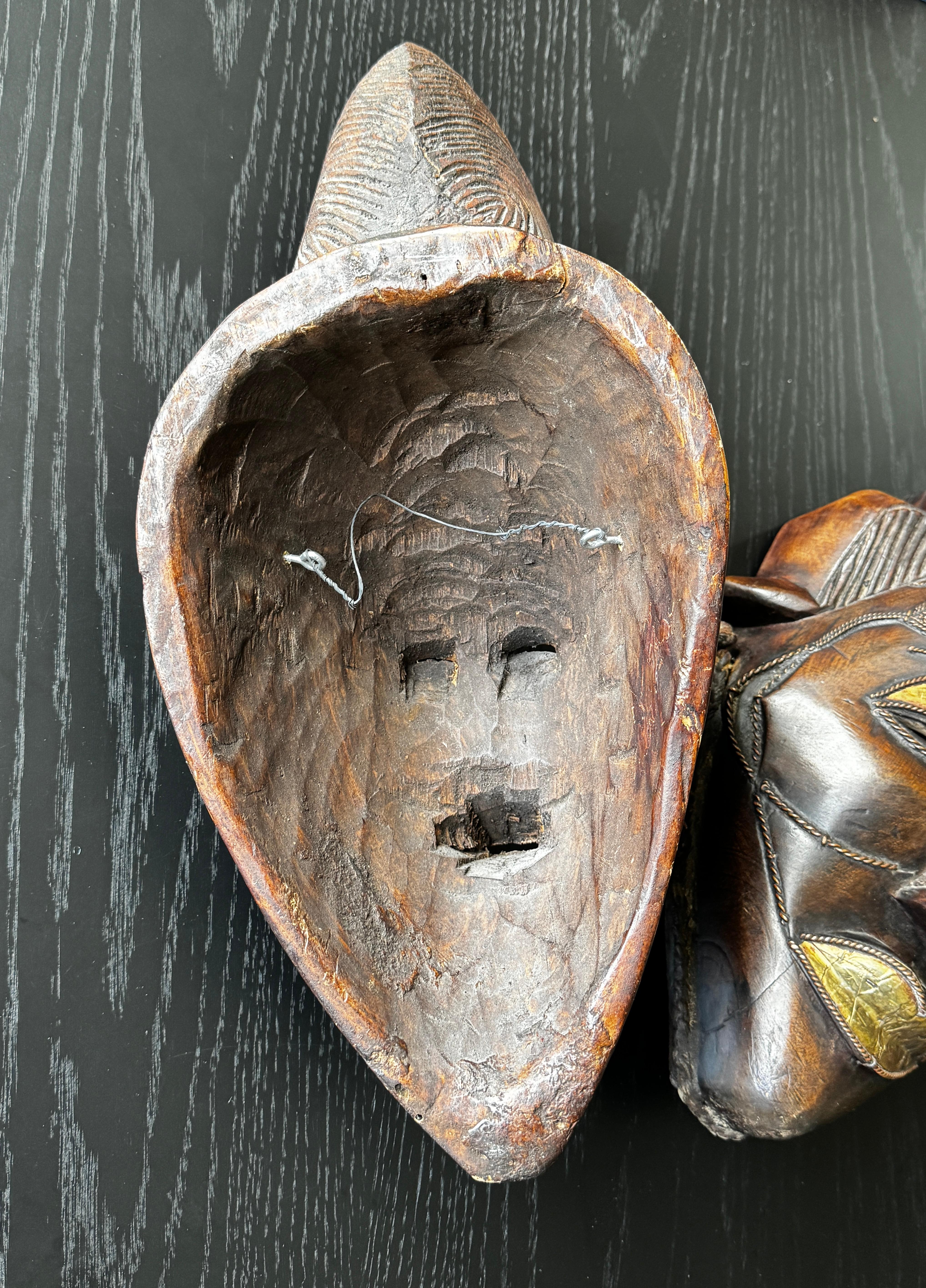 Two Carved Wood African Mask With Gilded Eyelids and Lips and Brass Decorations For Sale 6