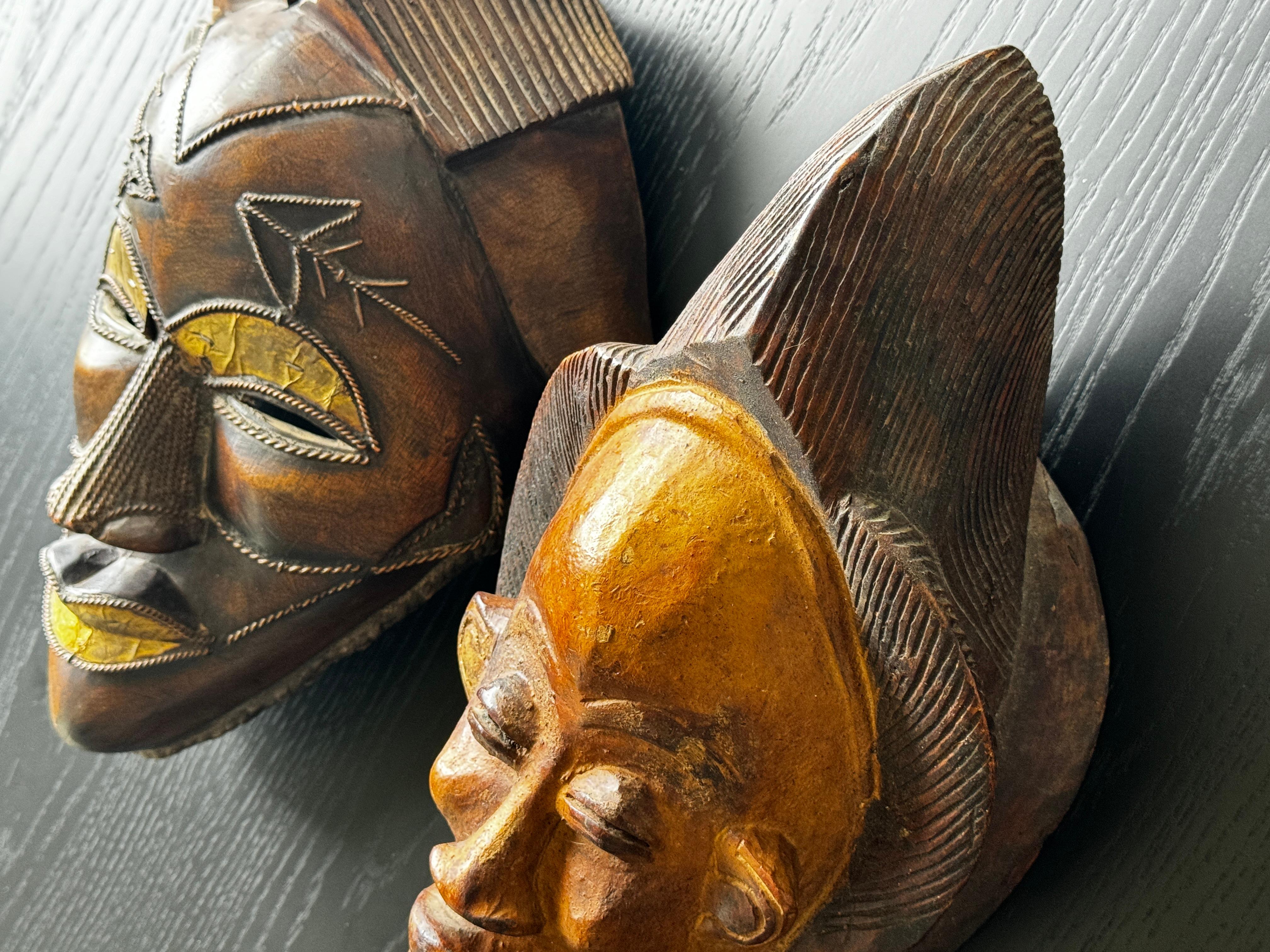 Two Carved Wood African Mask With Gilded Eyelids and Lips and Brass Decorations For Sale 3
