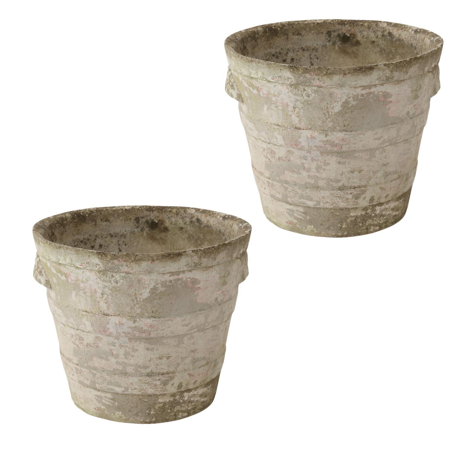 Two Cement Ribbed Urns