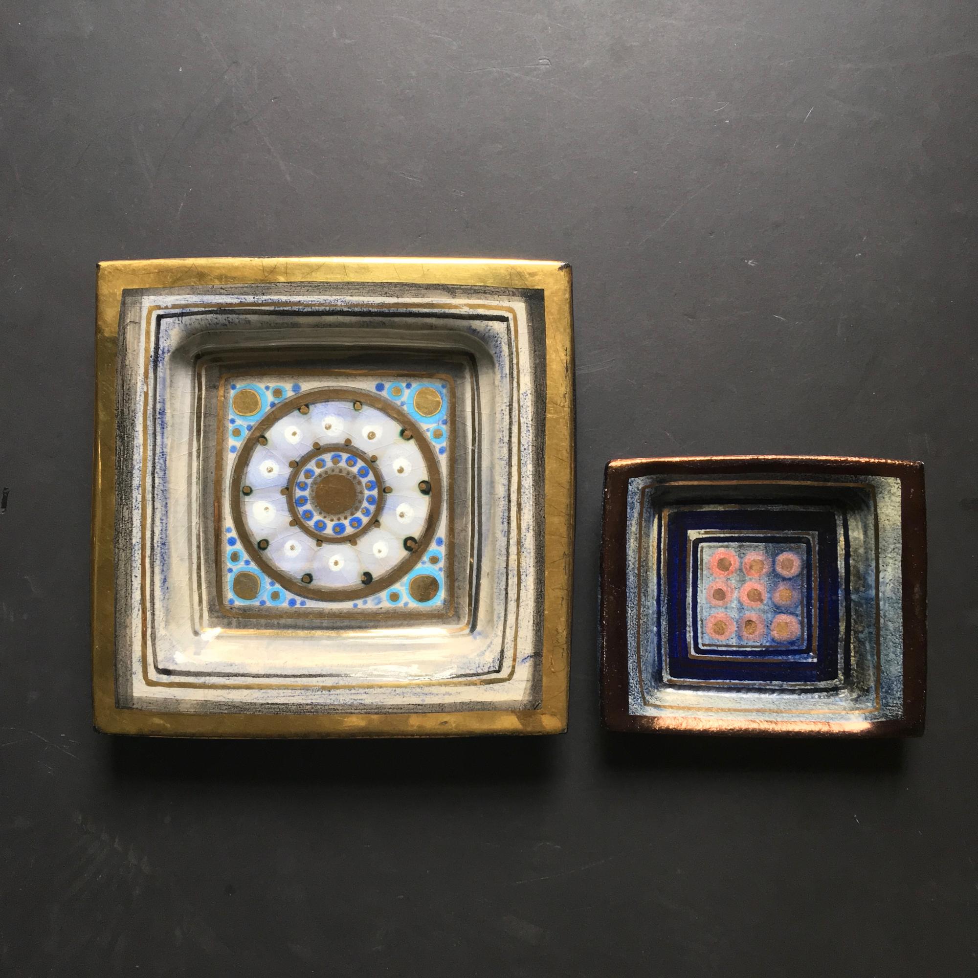 Two decorative ceramic plates or vide-poches by ceramicist Georges Pelletier, France 1960s.

Both pieces are hand-made ceramic, with attractive designs in shades of blue. The larger plate is of delicate tones of pale blue and grey with rich gold
