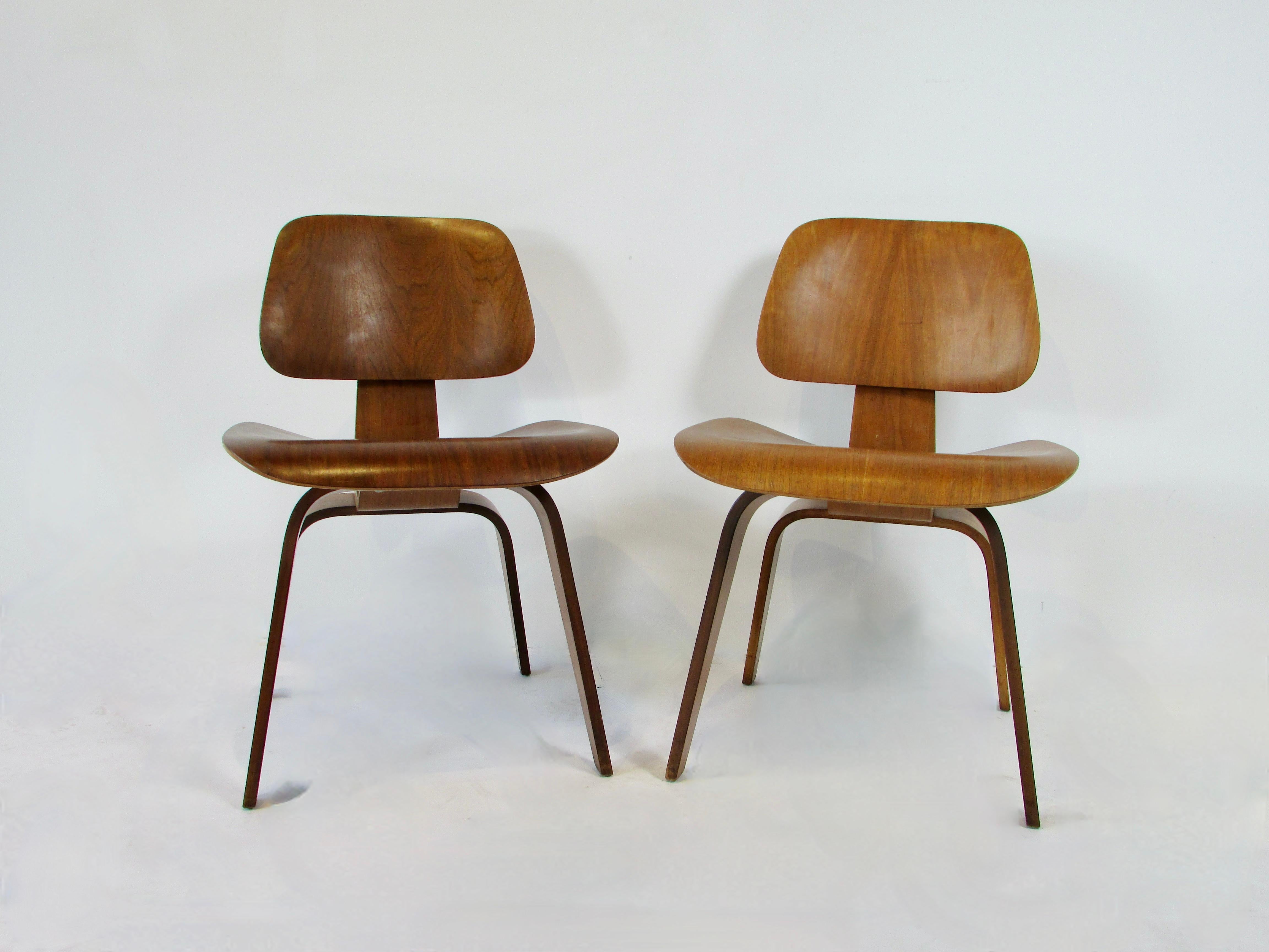 Two Charles and Ray Eames Herman Miller DCW chairs 6