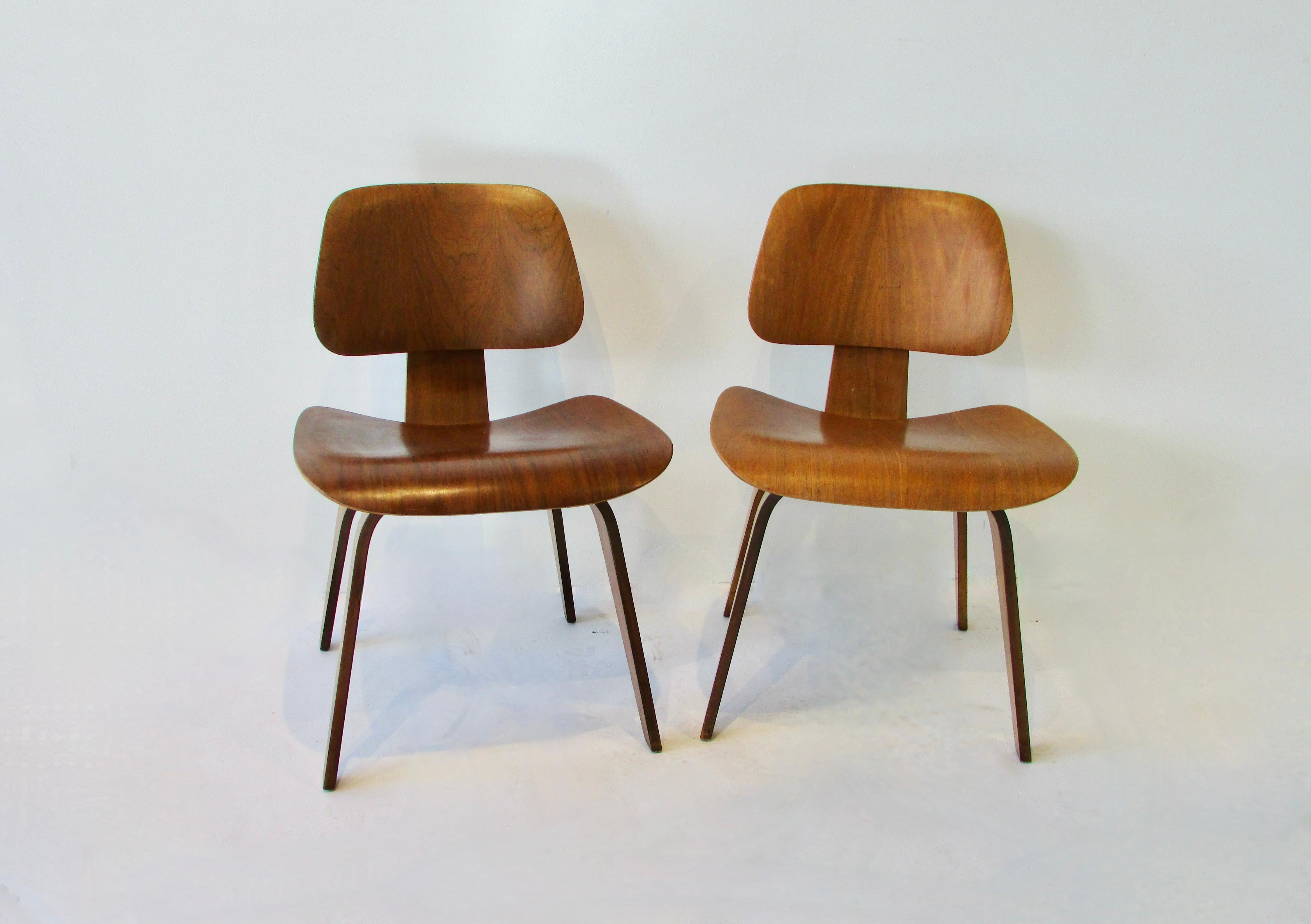 Mid-Century Modern Two Charles and Ray Eames Herman Miller DCW chairs