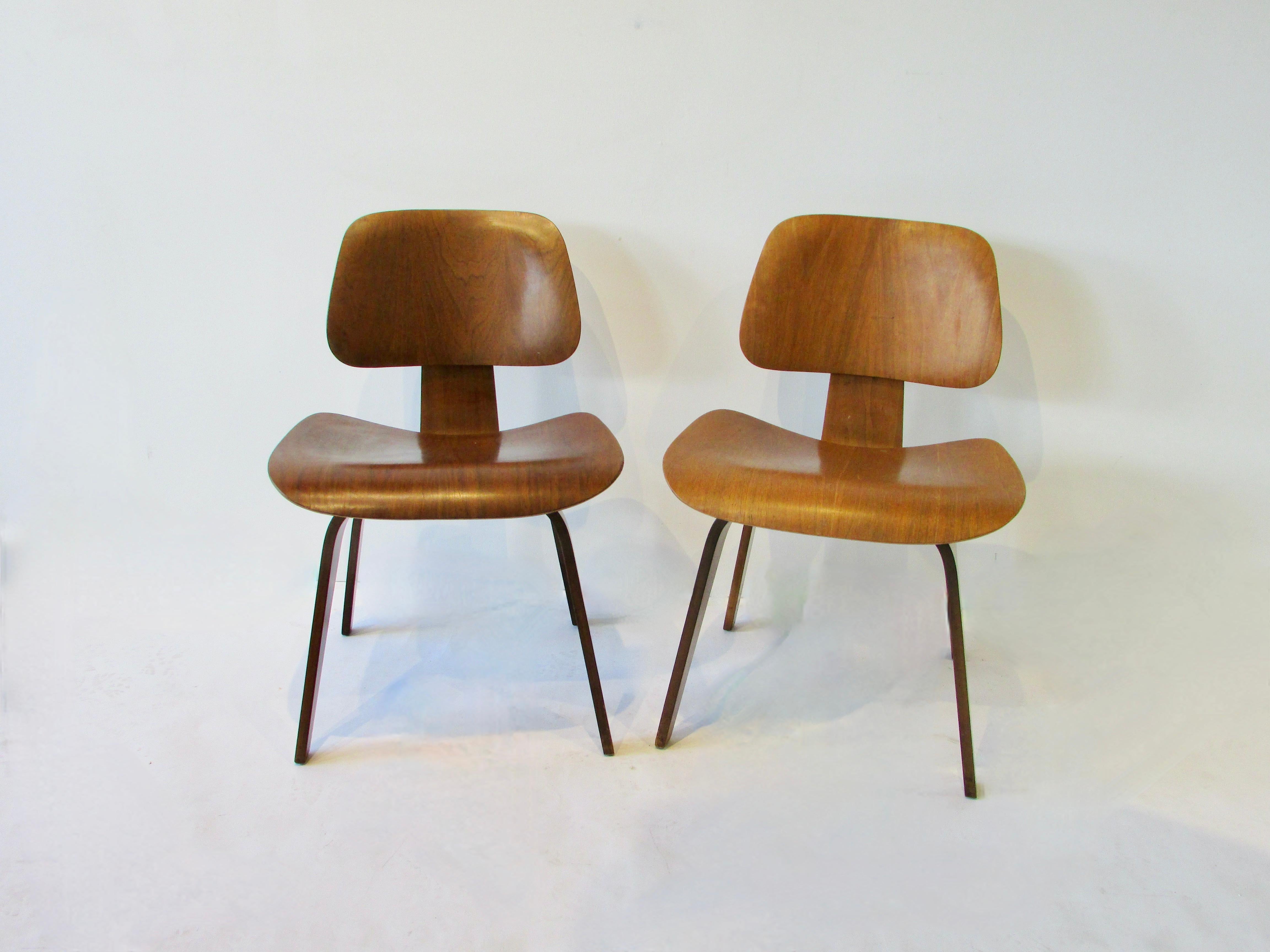 American Two Charles and Ray Eames Herman Miller DCW chairs For Sale