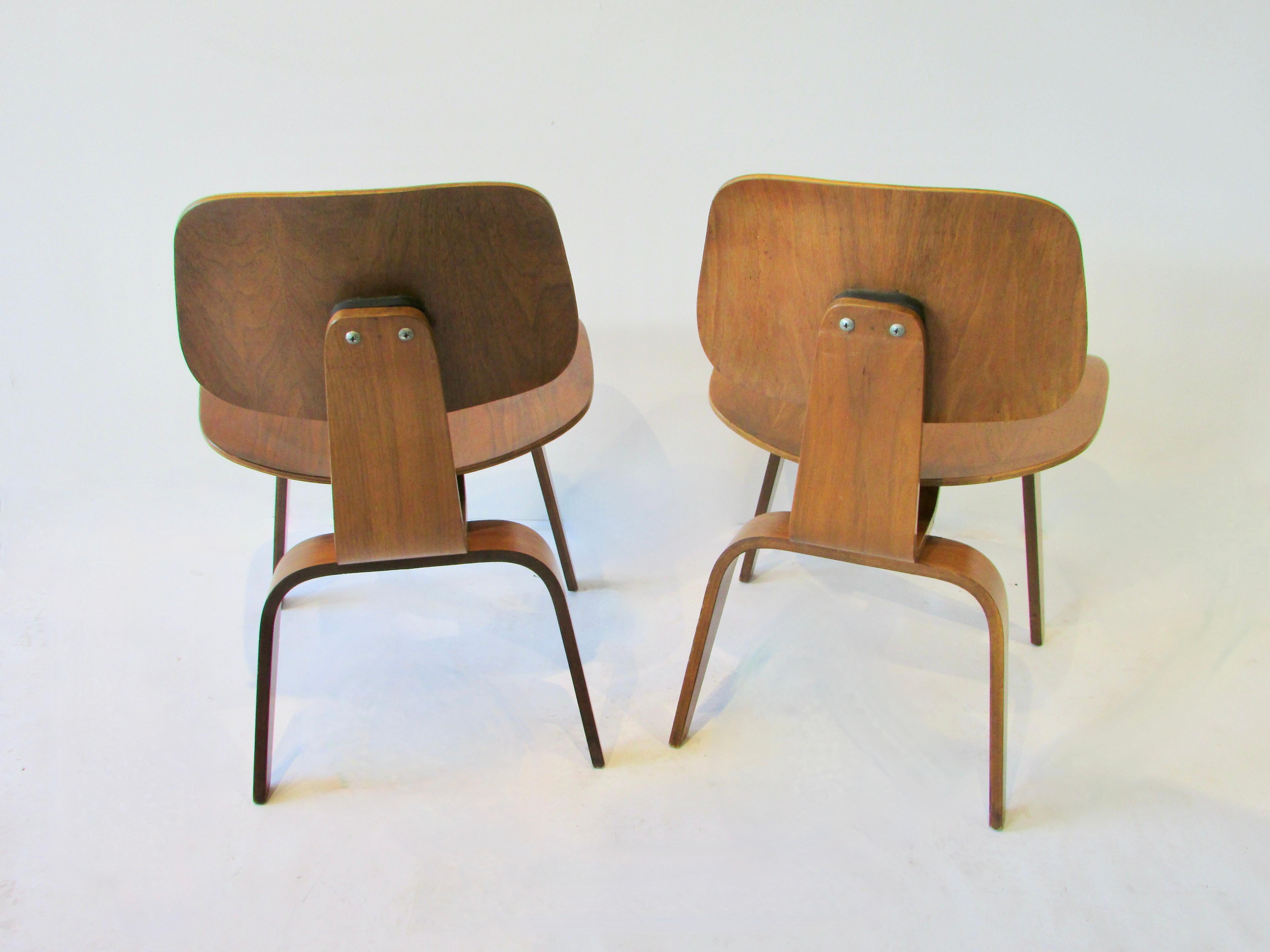 Plywood Two Charles and Ray Eames Herman Miller DCW chairs For Sale