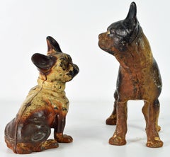 Two Charming Early 20th Century Painted Cast Iron Door Stop Dogs