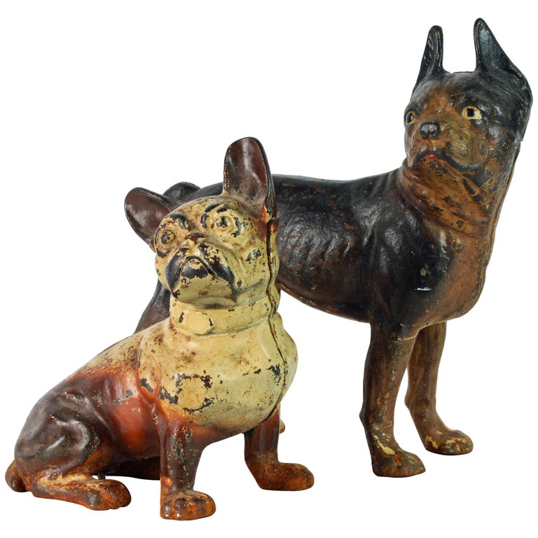 Two Charming Early 20th Century Painted Cast Iron Door Stop Dogs