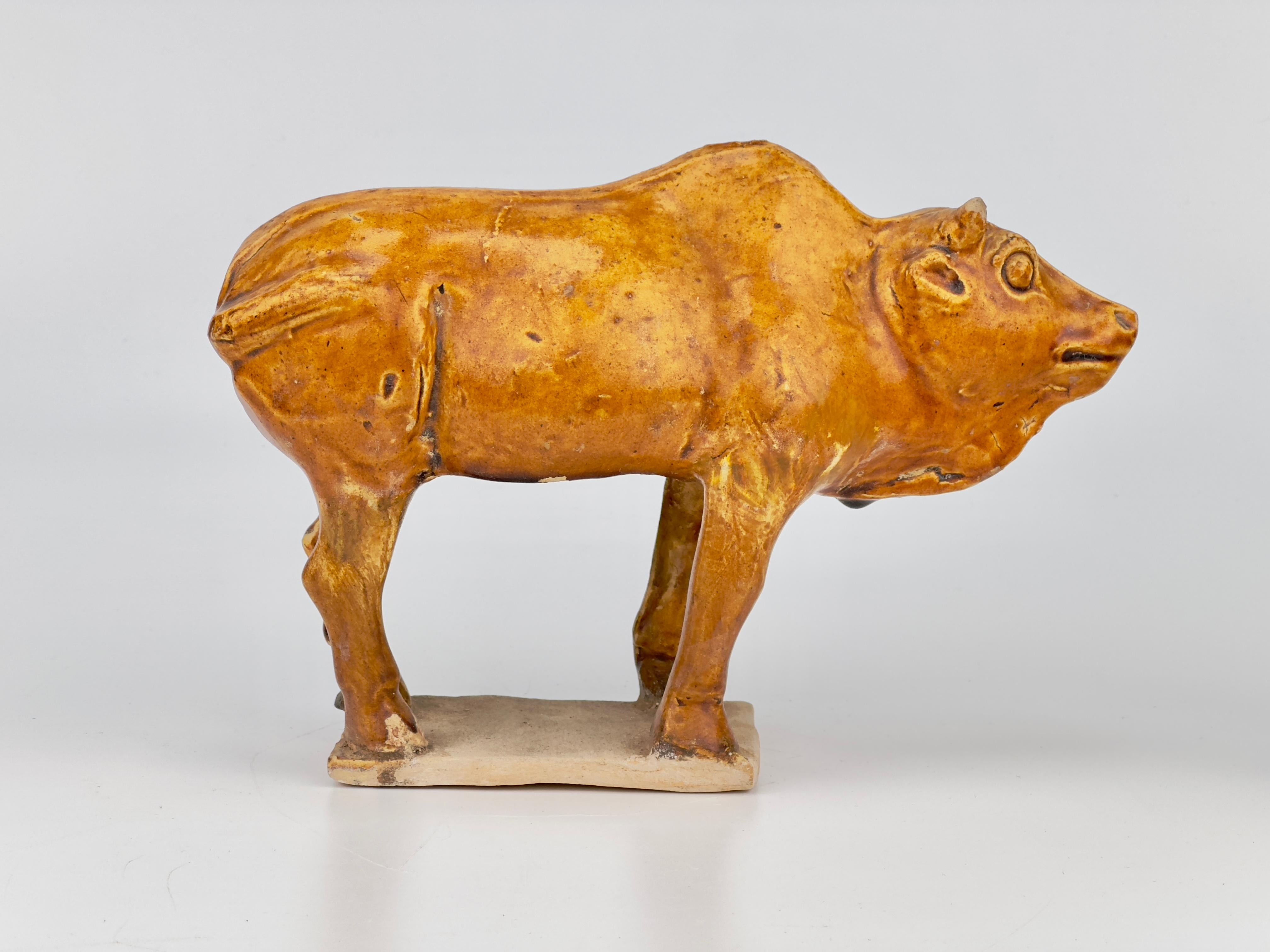 Glazed Two Chestnut-glazed Pottery Figure of Sacred Bulls, Tang Dynasty For Sale