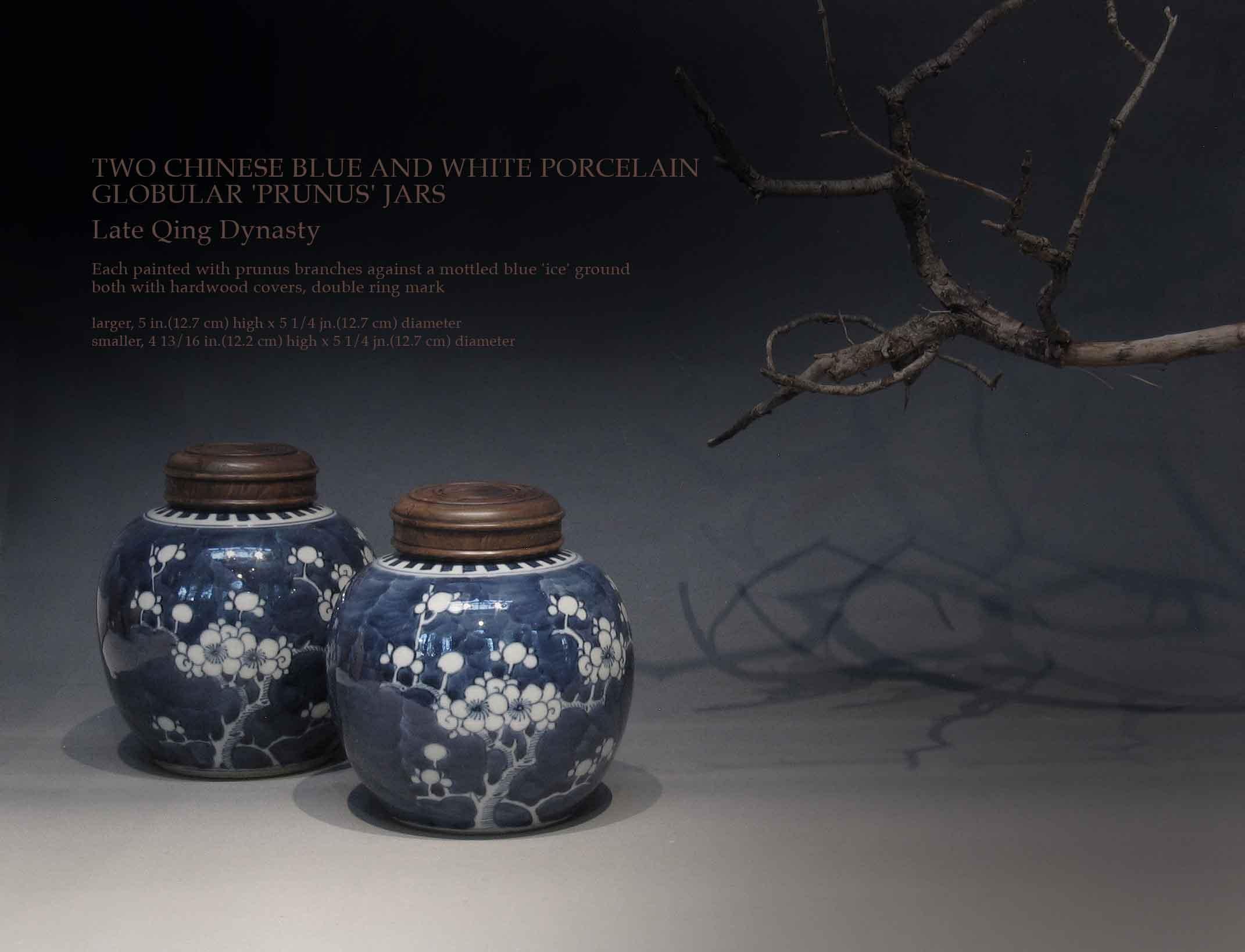 TWO CHINESE BLUE AND WHITE PORCELAIN
GLOBULAR 'PRUNUS' JARS

Late Qing Dynasty

Each painted with prunus branches against a mottled blue 'ice' ground
both with hardwood covers, double ring mark.

Larger : 5
