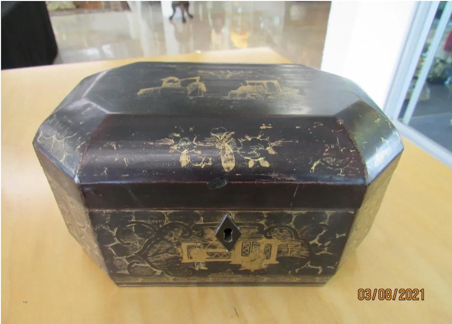 A Chinese Export lacquer tea caddy. Gilt lacquered tea caddy with two pewter canister inserts. Together with a larger Chinese export lacquer box with one interior fitted shelf (5
