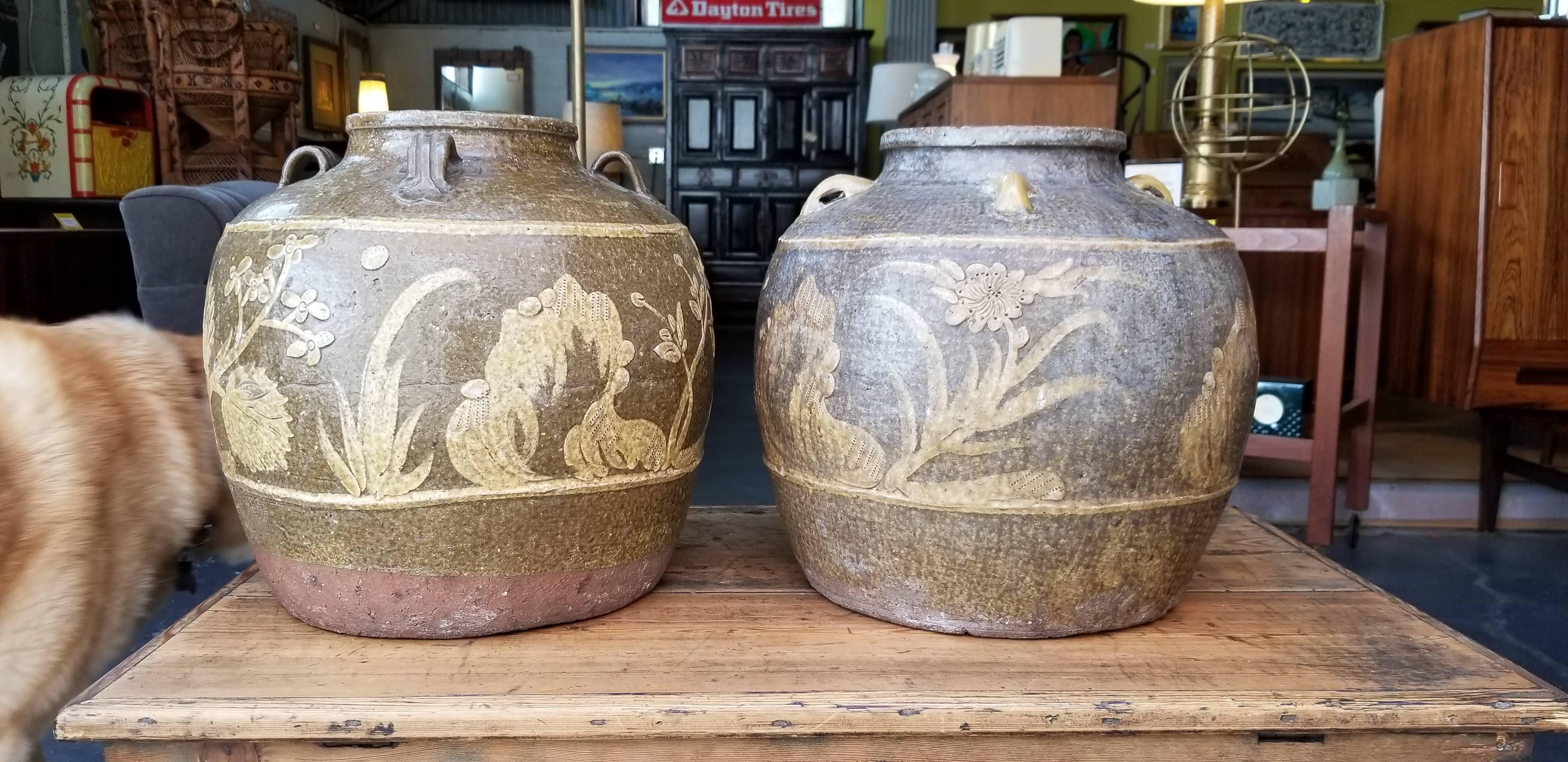 Extraordinary organic texture and earth-tone glaze to this pair of antique Martaban jars. Excellent condition.
