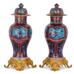 Two Chinese Qing Dynasty Porcelain Vases with Gilt Bronze Bases