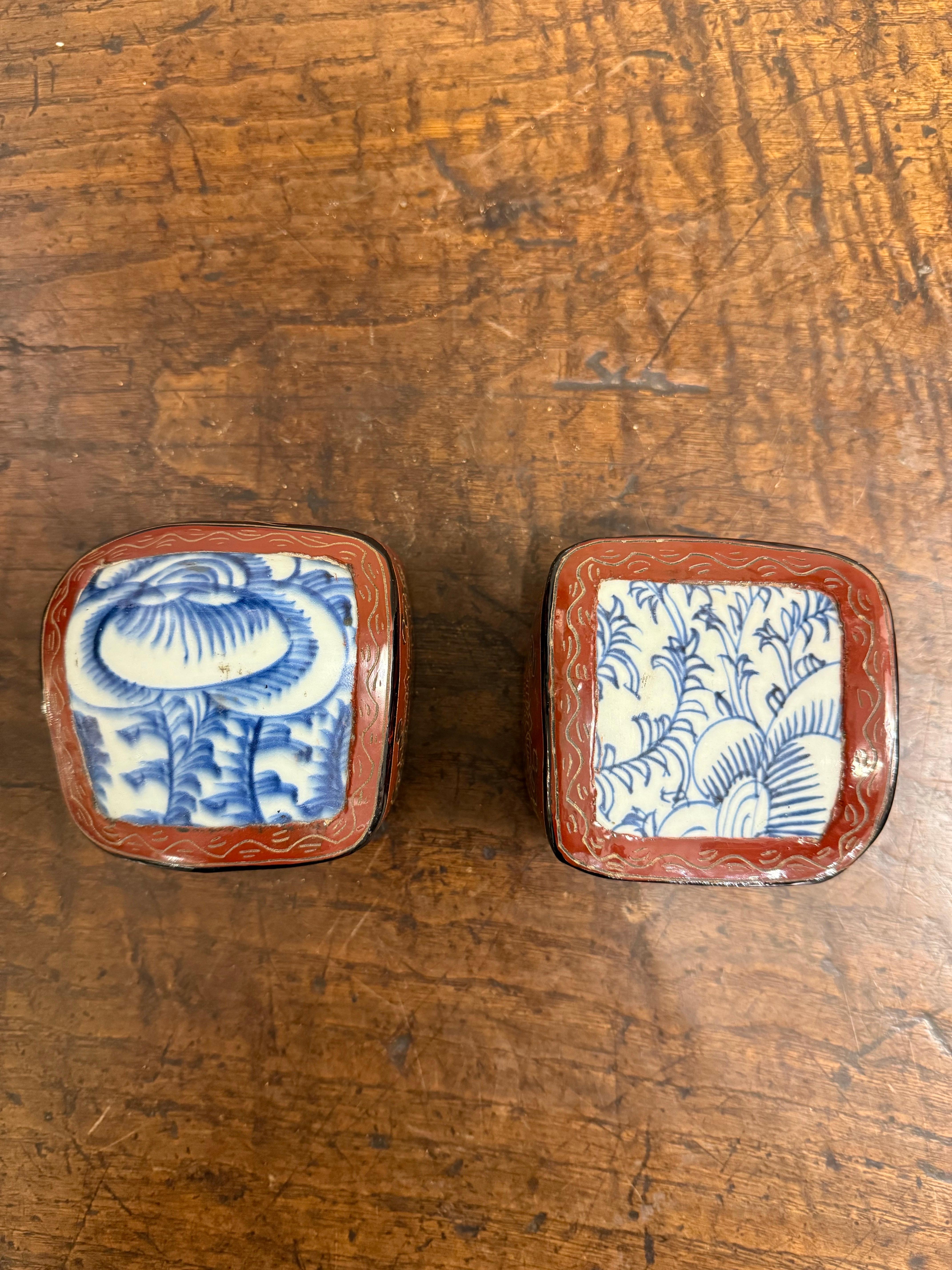 Two Chinese Red Lacquered Lidded Boxes with Blue and White Inserts, 20th Century

Provenance: Private Victoria Collection.

Dimensions:
Height: 6cm.
Width: 8cm.
Depth: 8cm.
