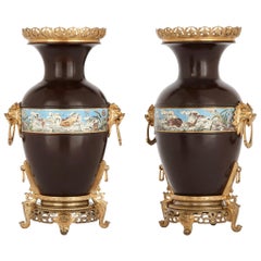 Two Chinese Style Enamelled Gilt and Patinated Bronze Urns