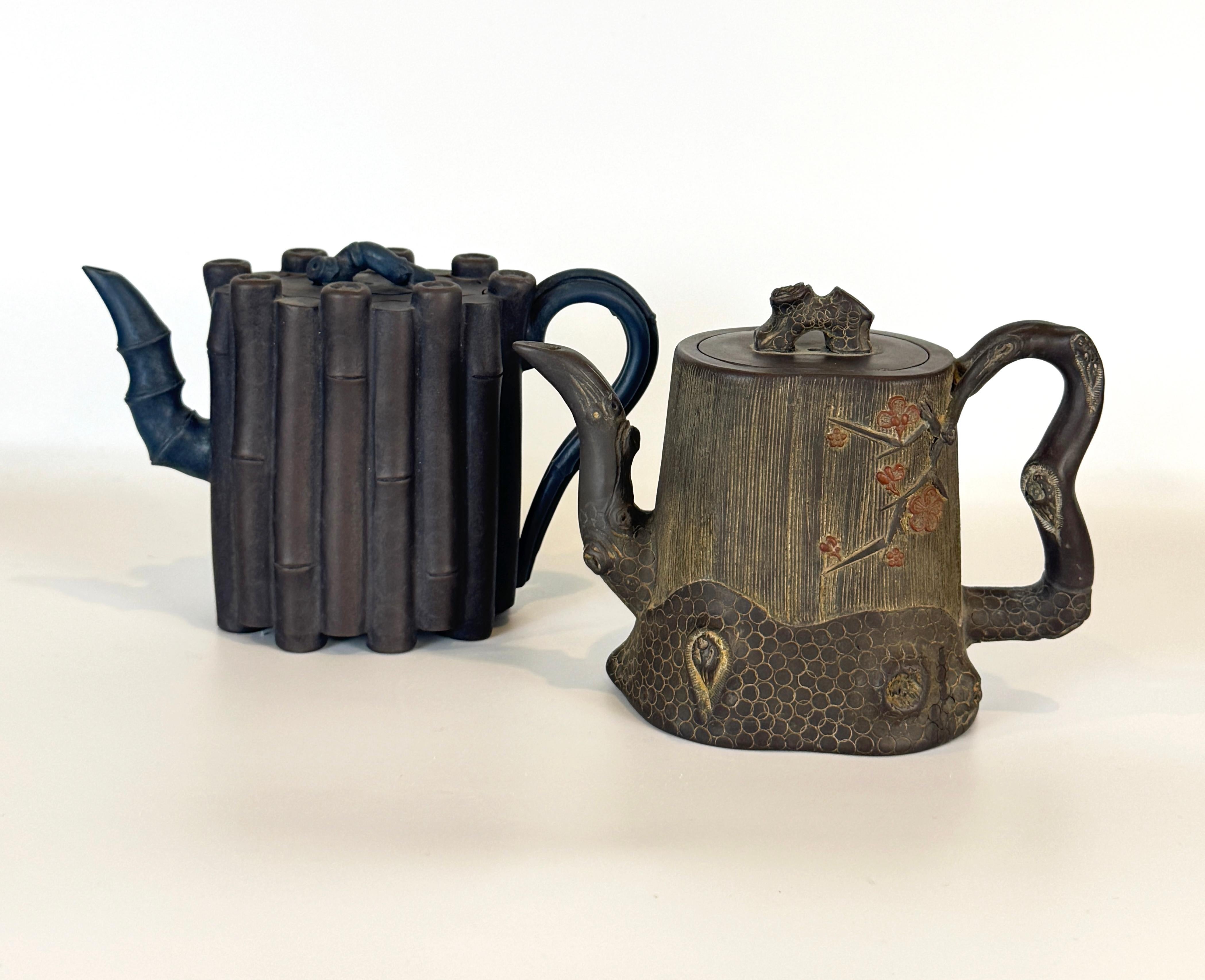 Two Chinese Yixing Clay Teapots, probably 20th century. These charming teapots are beautifully formed and decorated, with abundant texture brought out by their gentle coloring. The first teapot a collection of joined bamboo stalks in warm brown with
