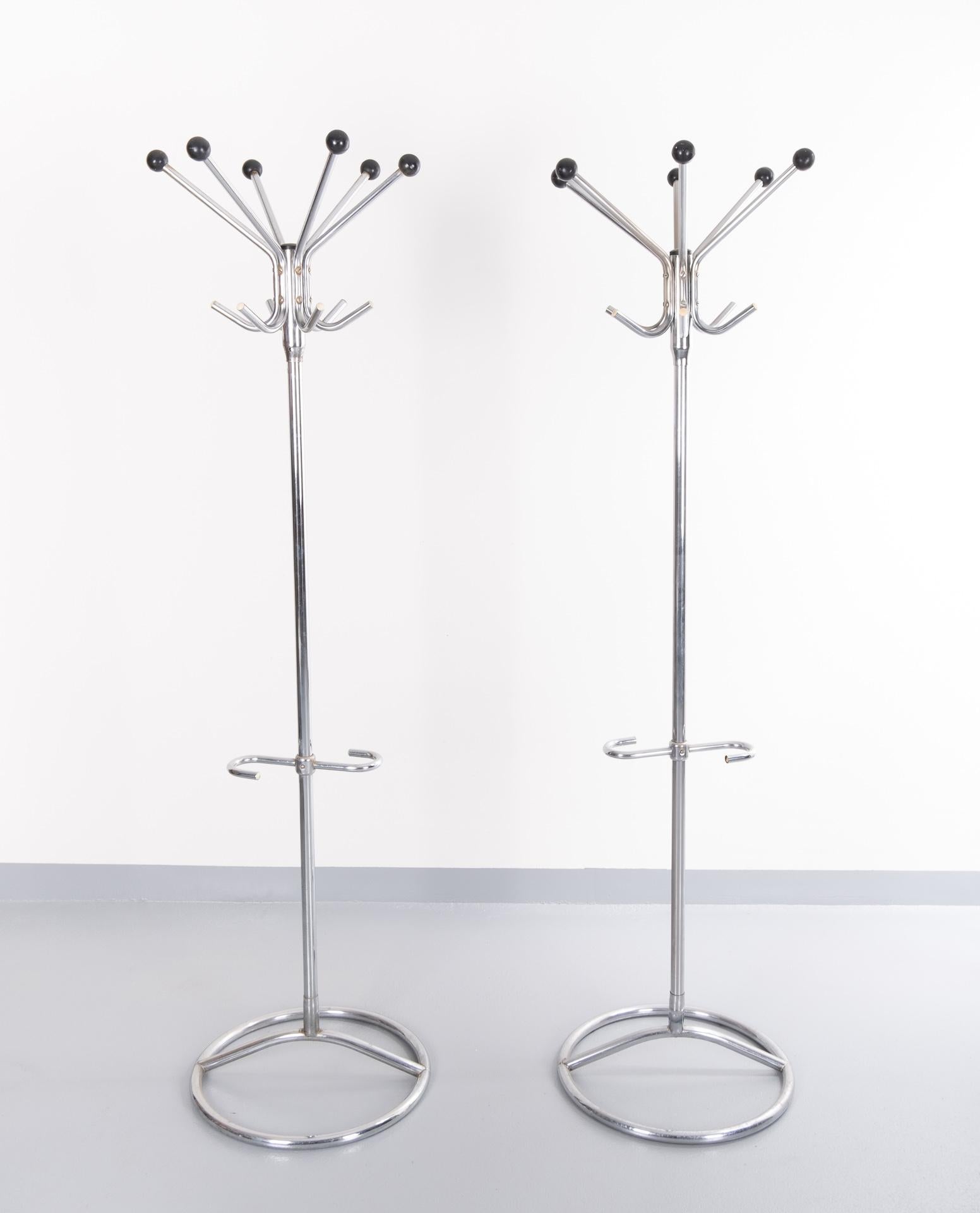 Two chrome standing coatracks. Comes with 6 wooden black balls. And place for your umbrella.
Chrome 1960s Tubax Belgium good condition.