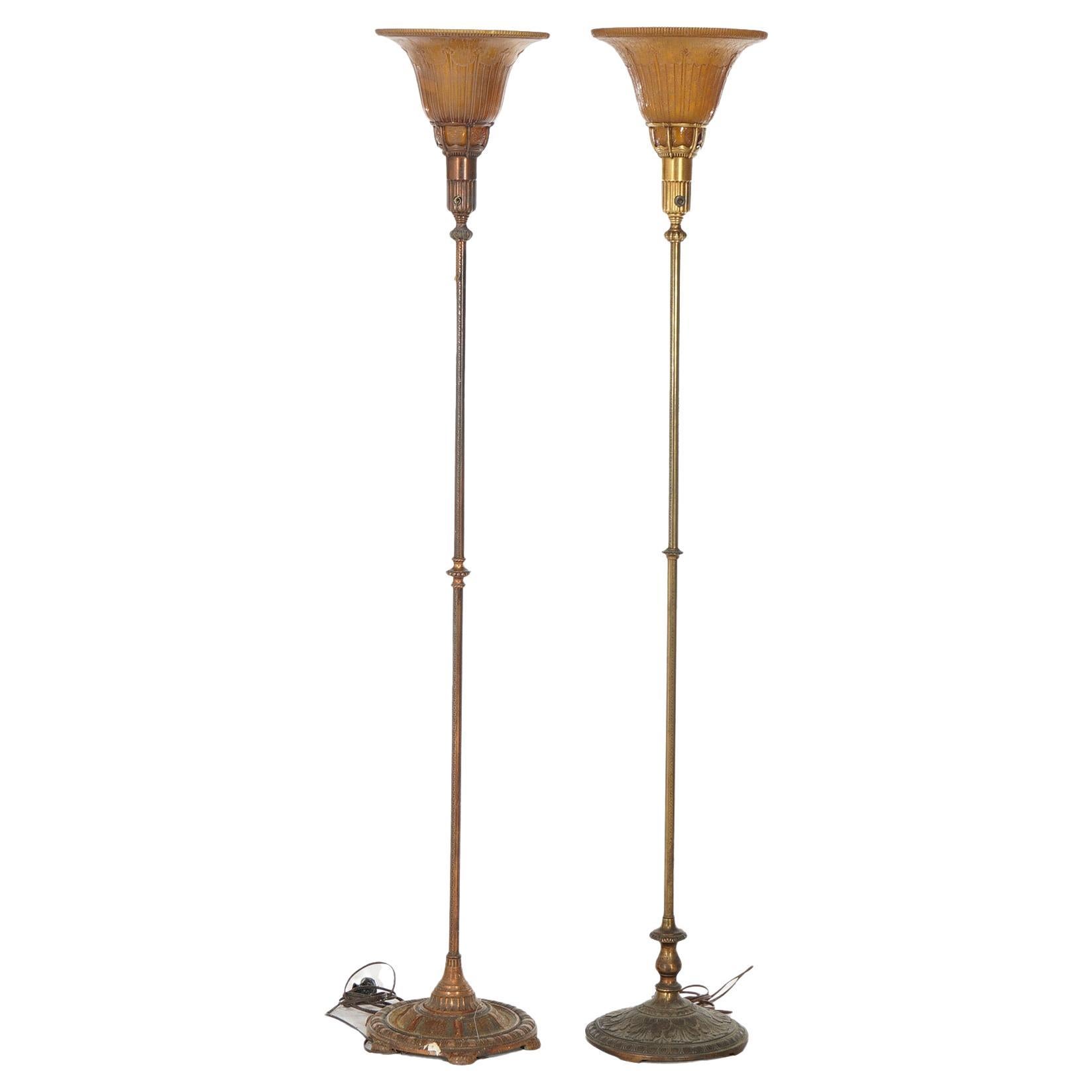 Two Classical Torchiere Gilt Metal & Amber Glass Floor Lamps by Lightolier
