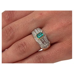 Two-Color 18 Kt Gold Ring with Emerald and Brilliant and Princess Cut Diamonds