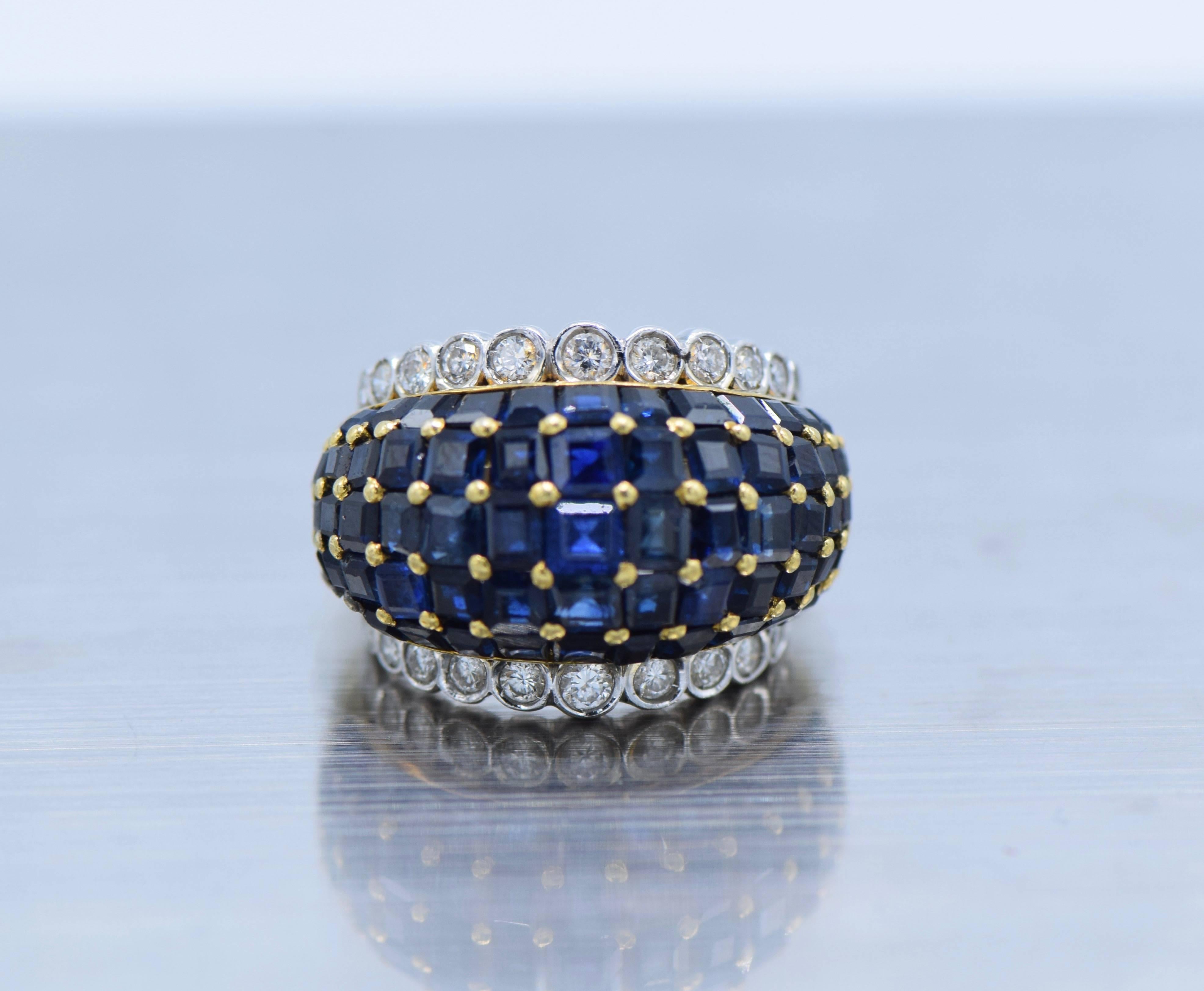 18 kt. yellow & white gold, 60 square-cut sapphires ap. 5.25 cts., 22 round & single-cut diamonds ap. .95 ct., ap. 10.7 dwts. 

Size 4 1/2. 

Sapphires: medium deep to dark royal blue, slightly included, 2 center stones chipped, several minor
