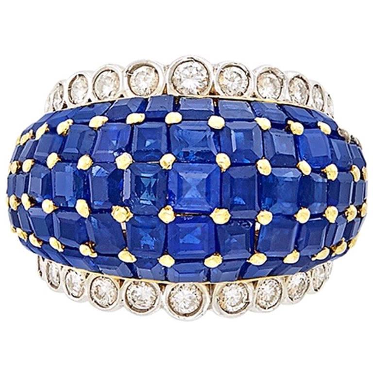 Bague bombée en or bicolore, saphir bleu foncé et diamant