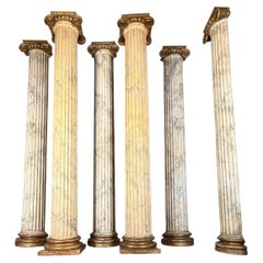deux colonnes et quatre demi-colonnes cannelées, bois sculpté et faux marbre, 18e
