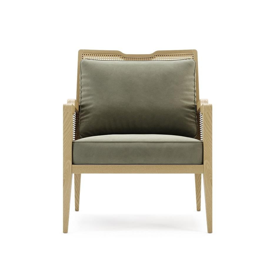 The natural wooden structure features a rattan back and side handcrafted using the Portuguese traditional techniques. Two upholstered velvet cushions are placed on the seat and back of the armchair 
Treatments: Fire Resistant; Pet Proof; Water