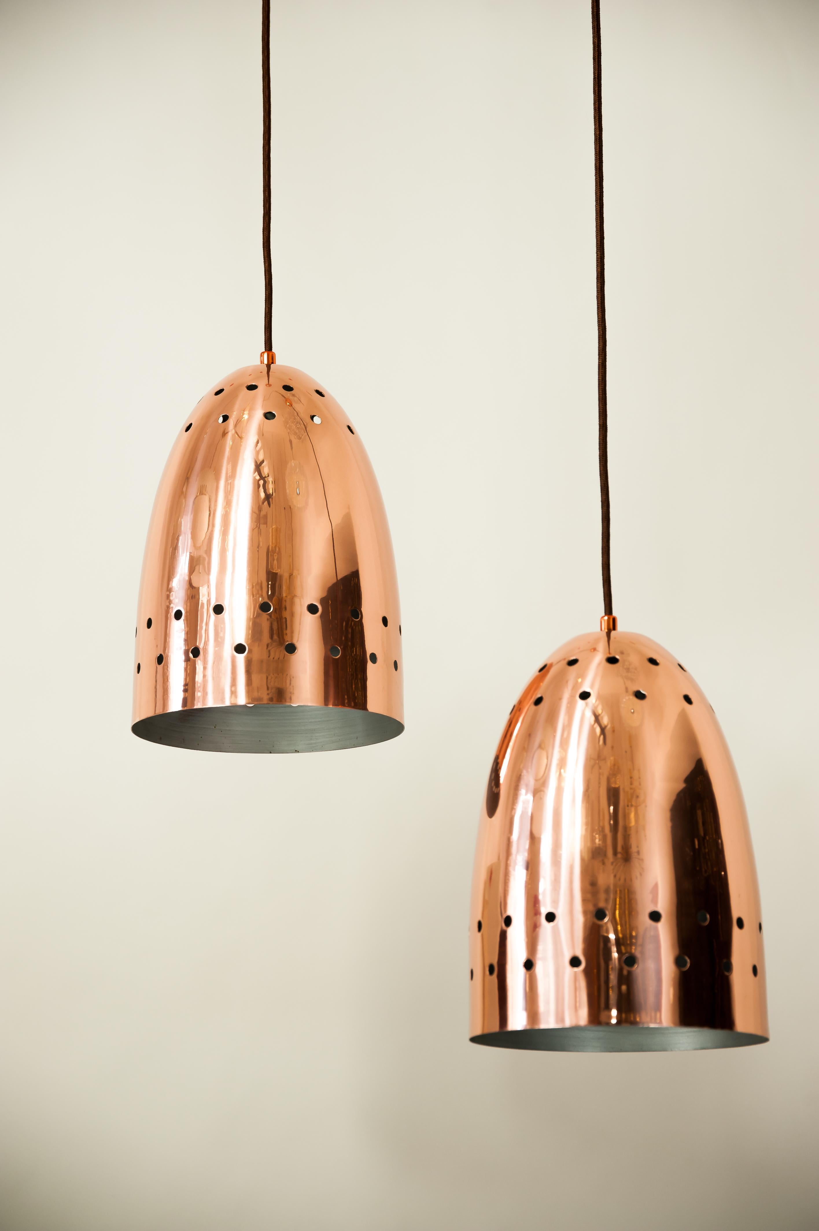 Two Copper J.T Kalmar Pendants, circa 1950s.
Polished and stove enameled.