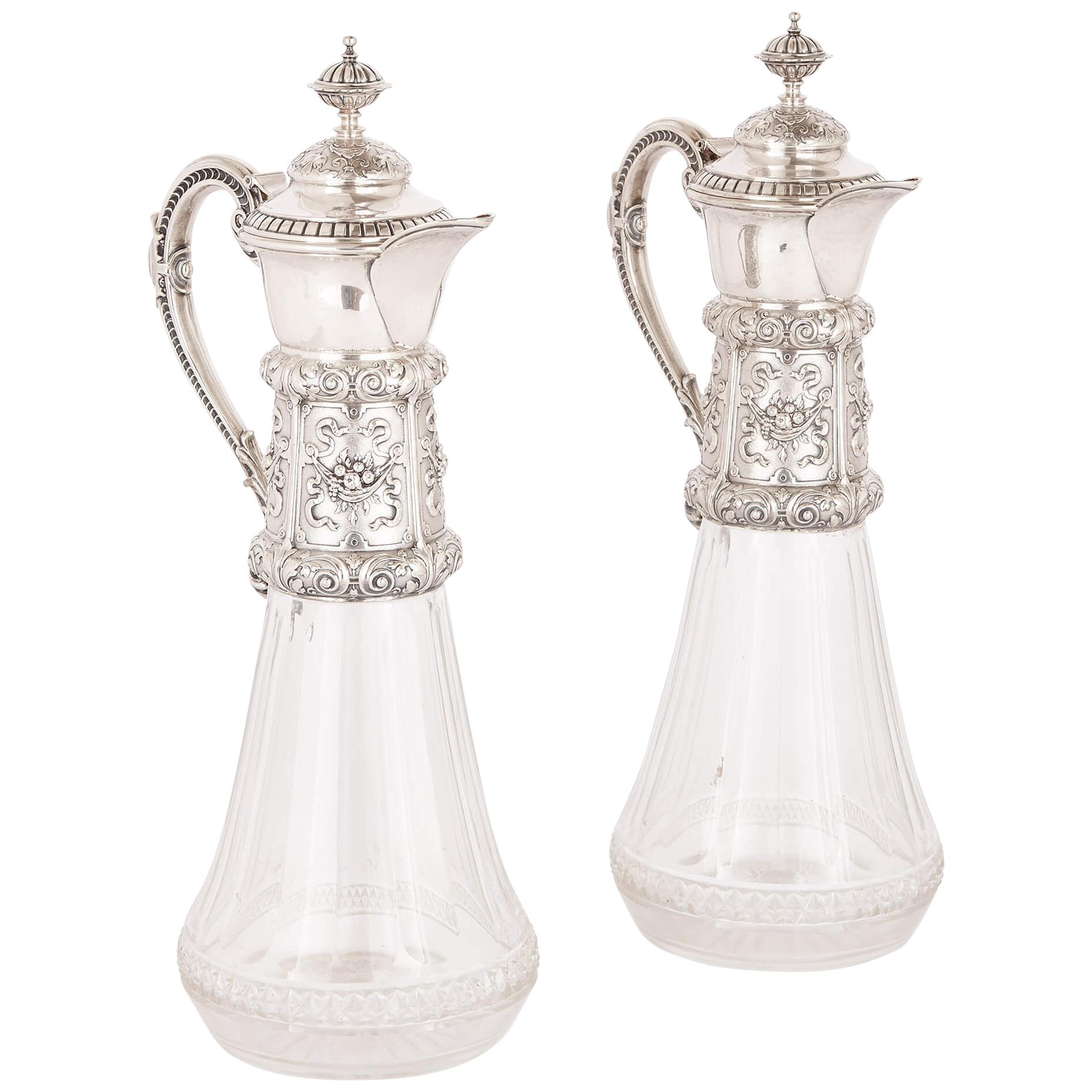 Dos jarras de vidrio tallado y clarete de plata, S. XIX