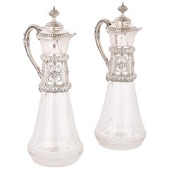 Dos jarras de vidrio tallado y clarete de plata, S. XIX