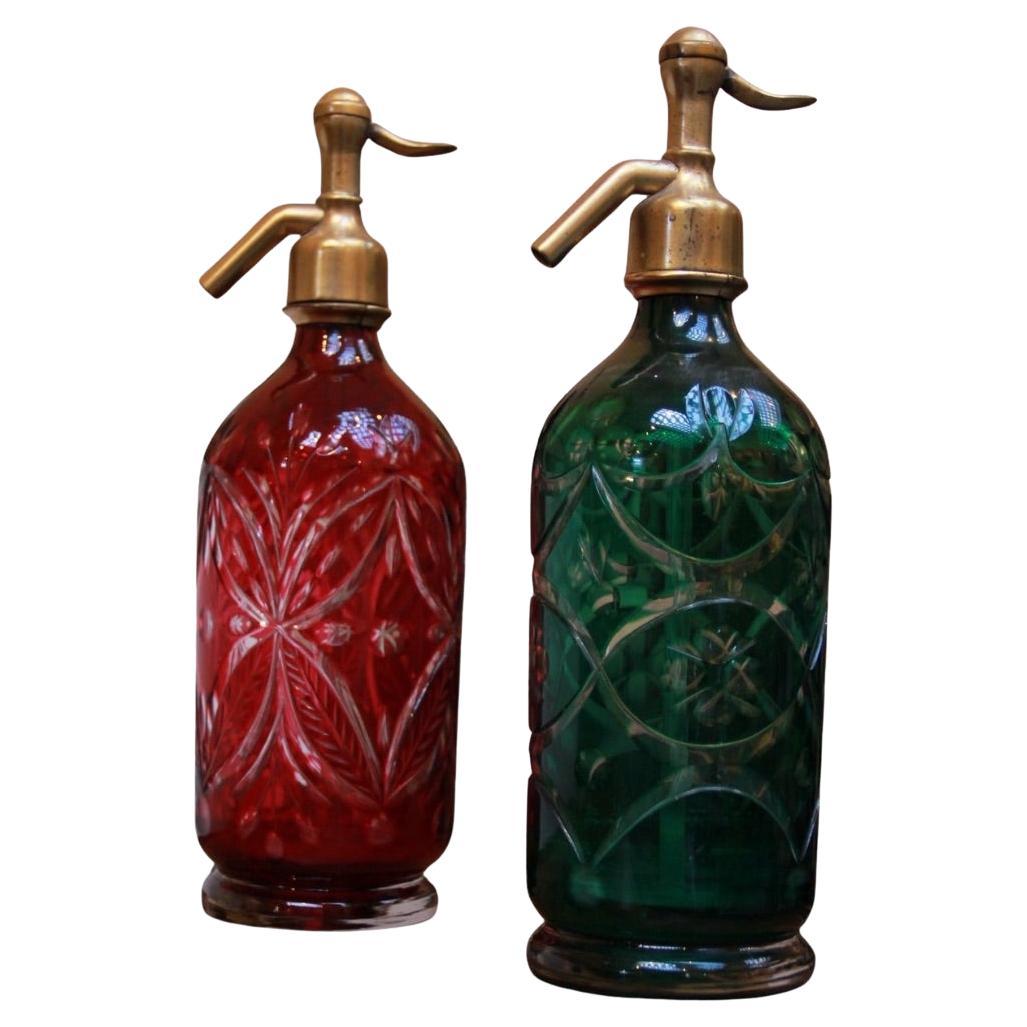 Deux siphons à soda en verre taillé